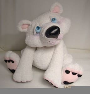 White terrycloth teddy bear sewn from an old robe, blue eyes and pink paw pads