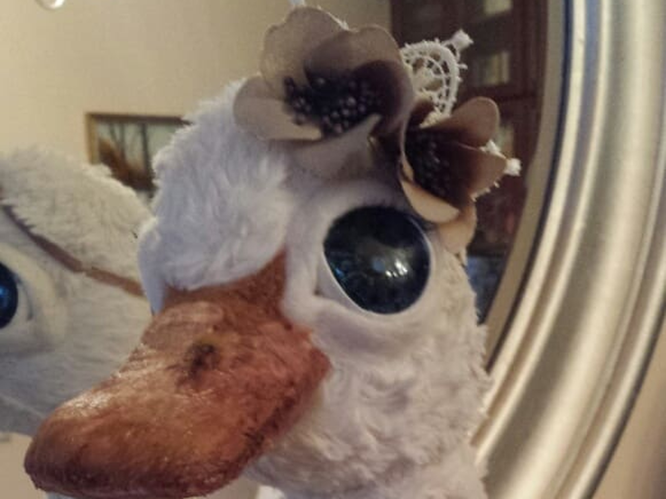 Custom goose plush, fabric flowers and big blue eyes Handmade goose plush head with fabric flowers, lace and big dark blue eyes, sewn to order as a custom gift