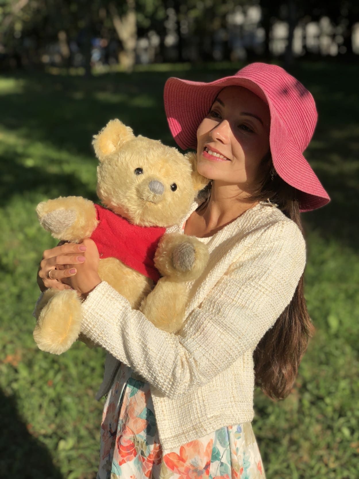 Hugging a handmade Winnie the Pooh mohair bear Woman hugging a handmade Winnie the Pooh plush, custom Christopher Robin mohair bear made to order