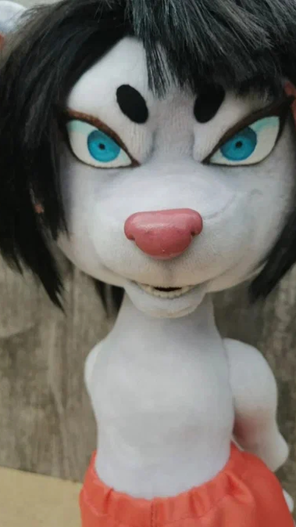 Akane Yamakawa rat plush face with bright blue eyes, black hair and a pink nose, a custom handmade plush