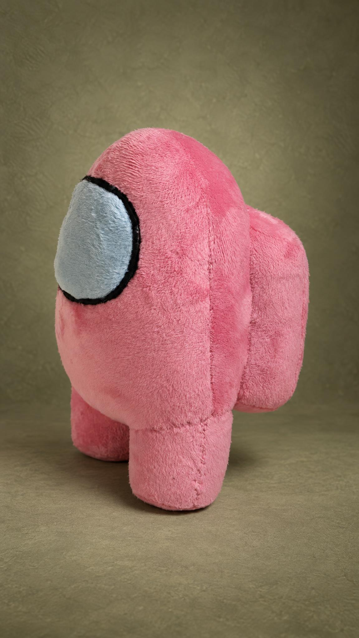 Pink Among Us soft toy with its backpack and blue visor, a custom handmade crewmate plush