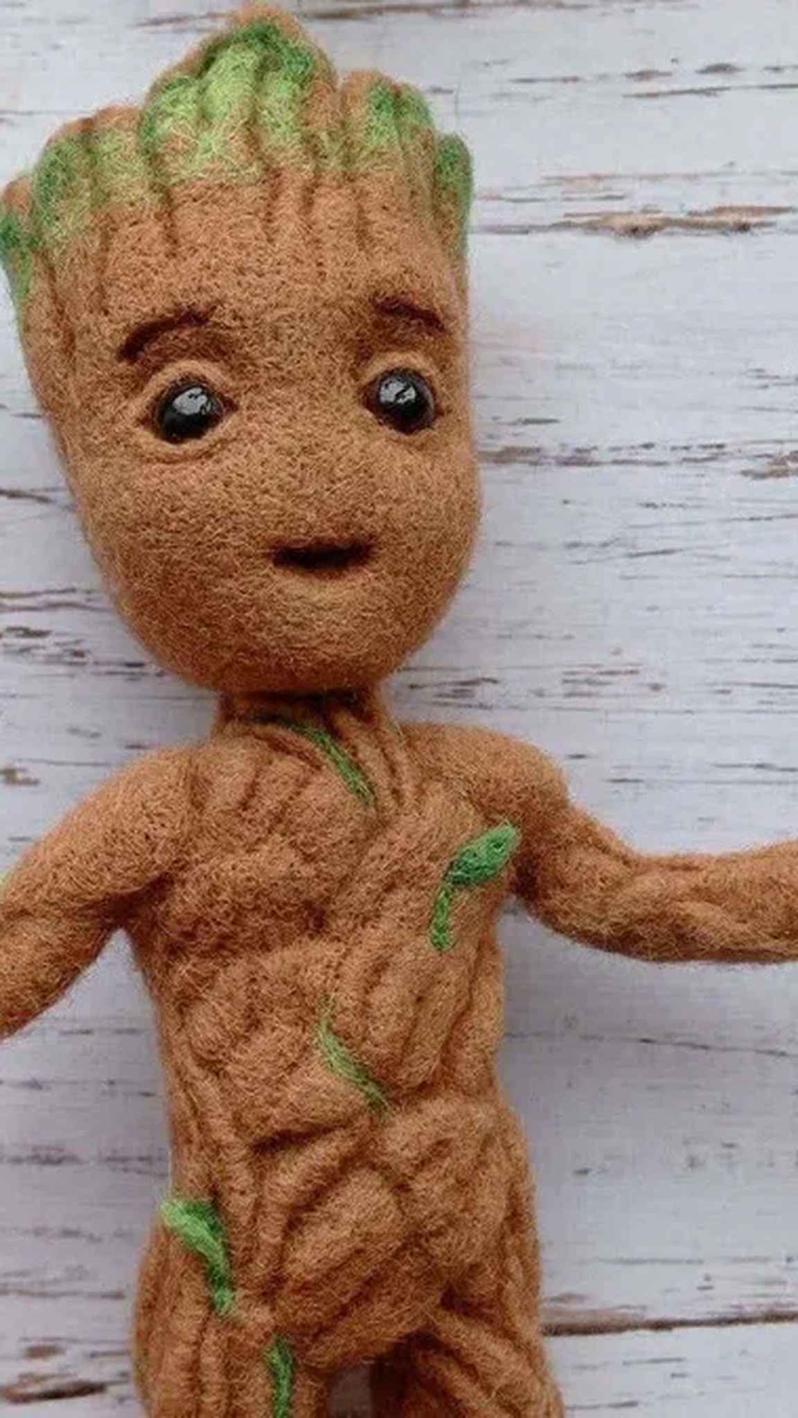 Baby Groot plush face with moss-green tufts and bark texture, needle-felted from wool to order