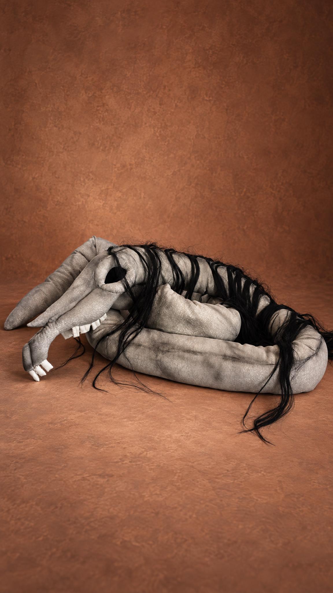 Big custom Long Horse plush: the long grey neck stretched out behind the skull, black hair along its length