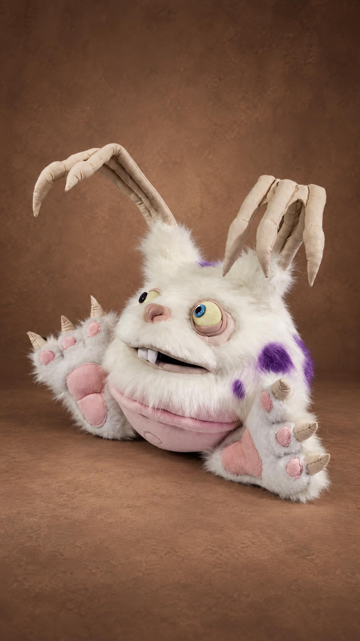 Blabbit plushie from My Singing Monsters grinning with two buck teeth, pink paw pads and claws, sewn to order