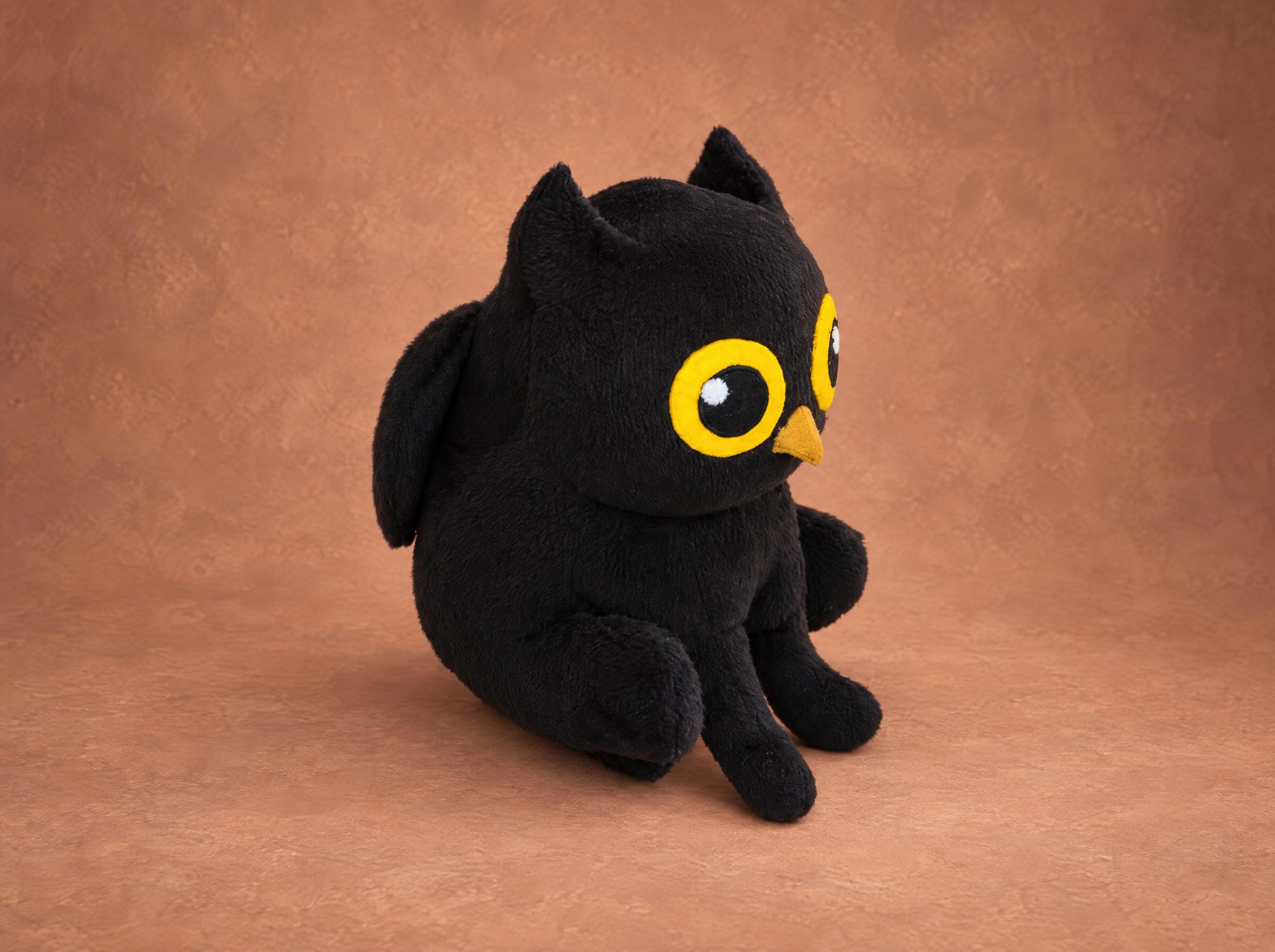 Black owl-cat plush, company mascot sample Black owl-cat plush sewn as a company mascot sample, made to order: cat legs and paws, wing, yellow owl eyes