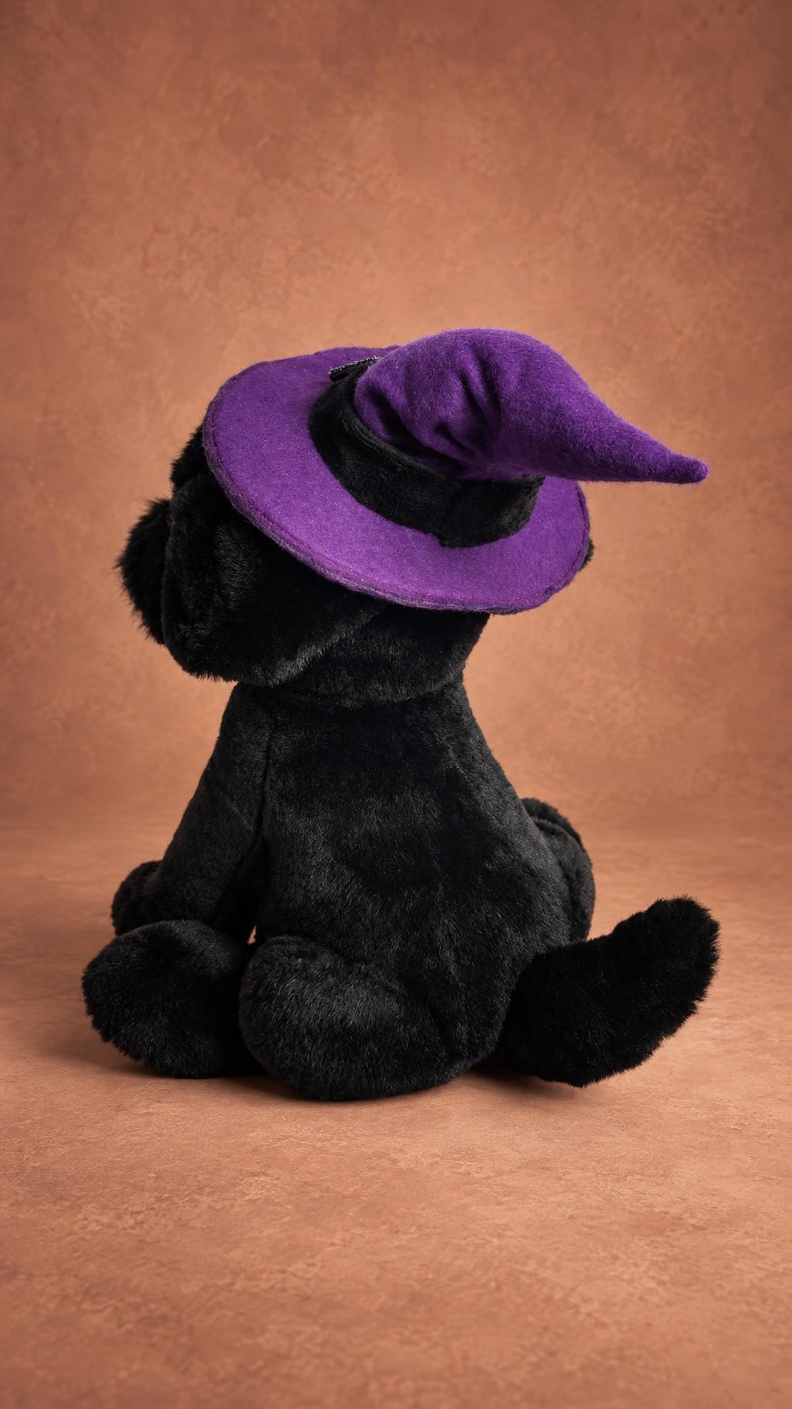 Black terrier mascot plush from behind: purple witch hat brim, black faux fur and soft round paws, custom made