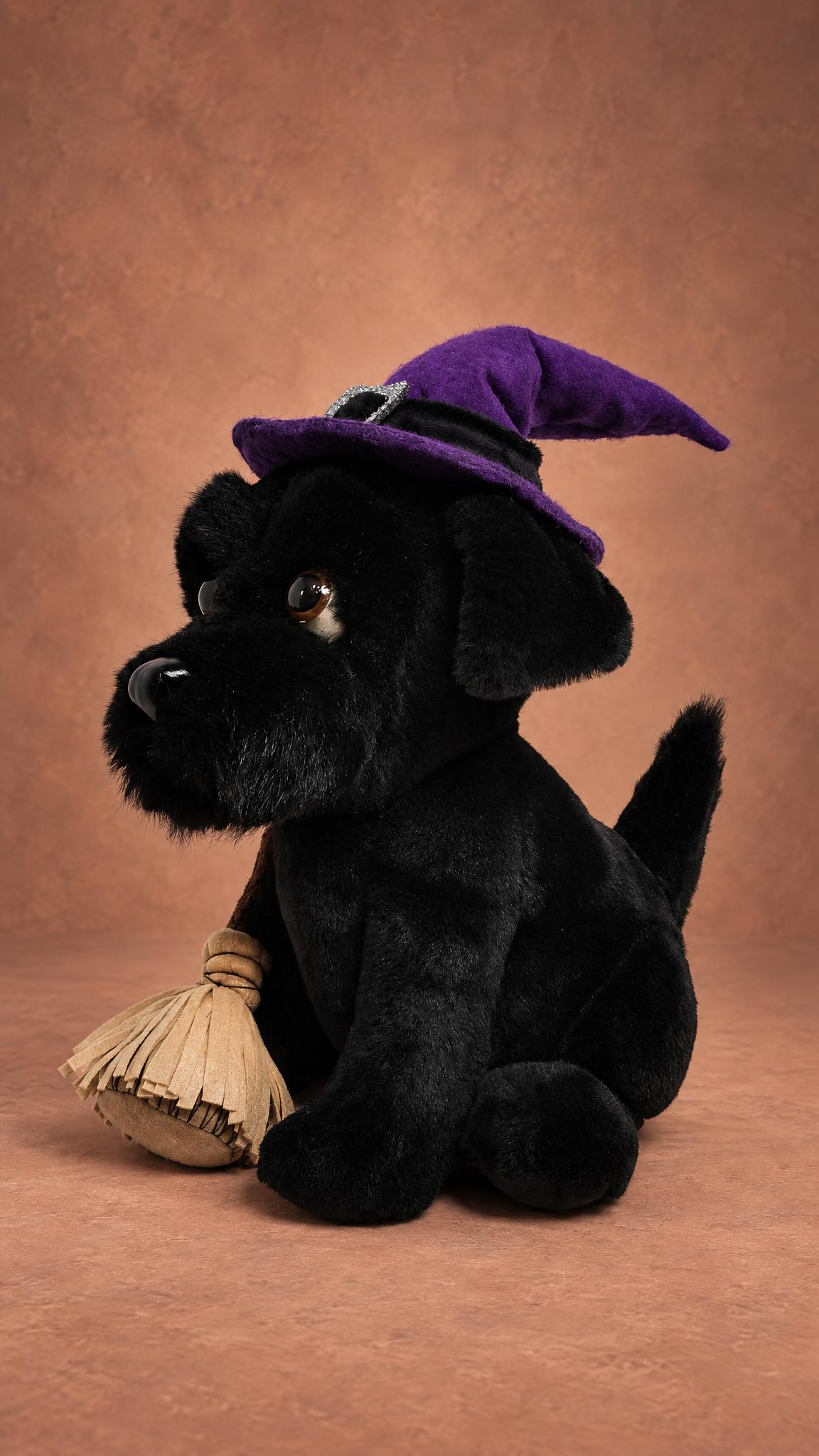Black terrier plush mascot with a short upright tail, floppy ears and a purple witch hat, made to order by hand