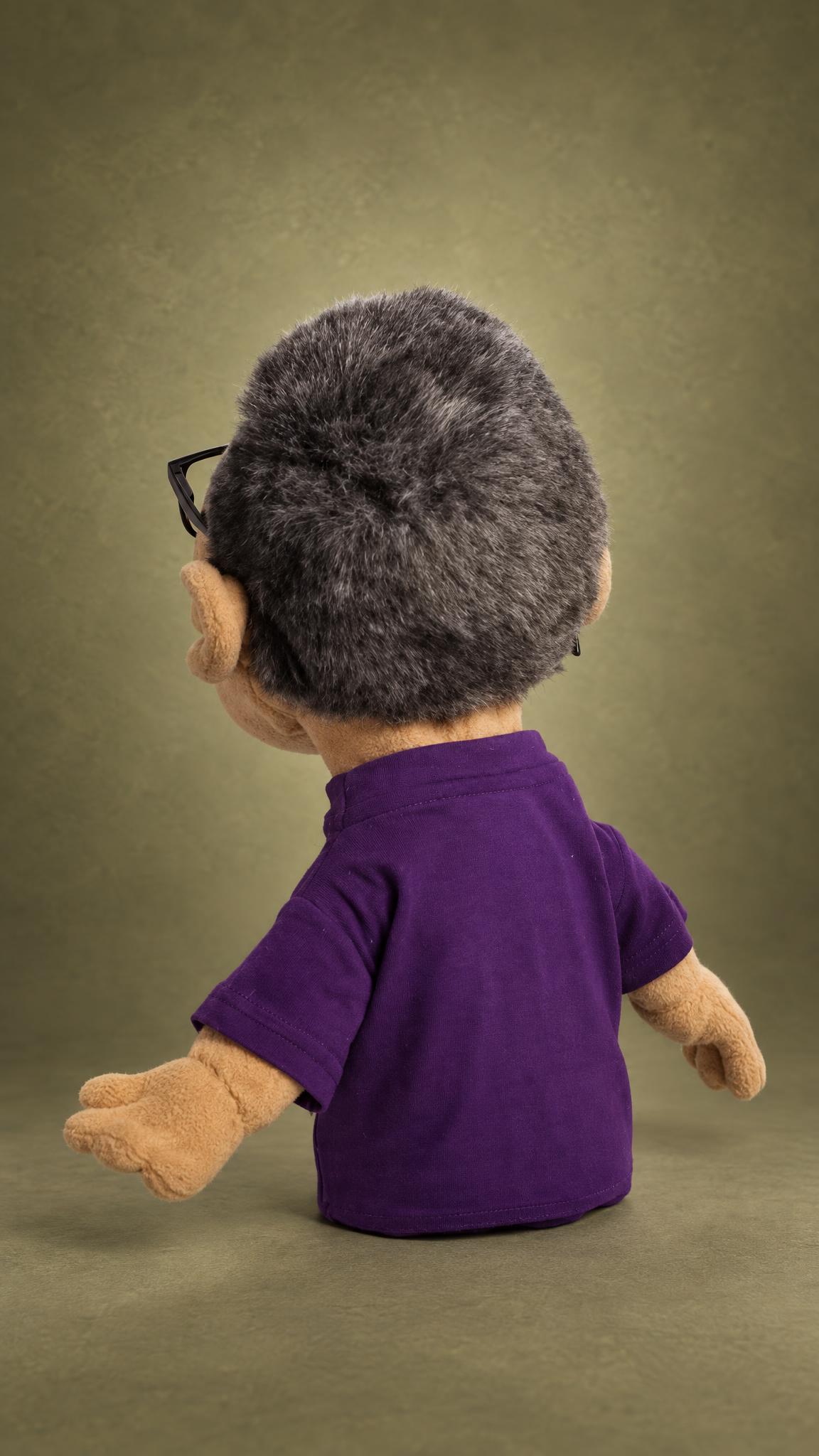 Look-alike puppet of a blogger: thick gray faux fur hair and a short-sleeved purple T-shirt, handmade to order