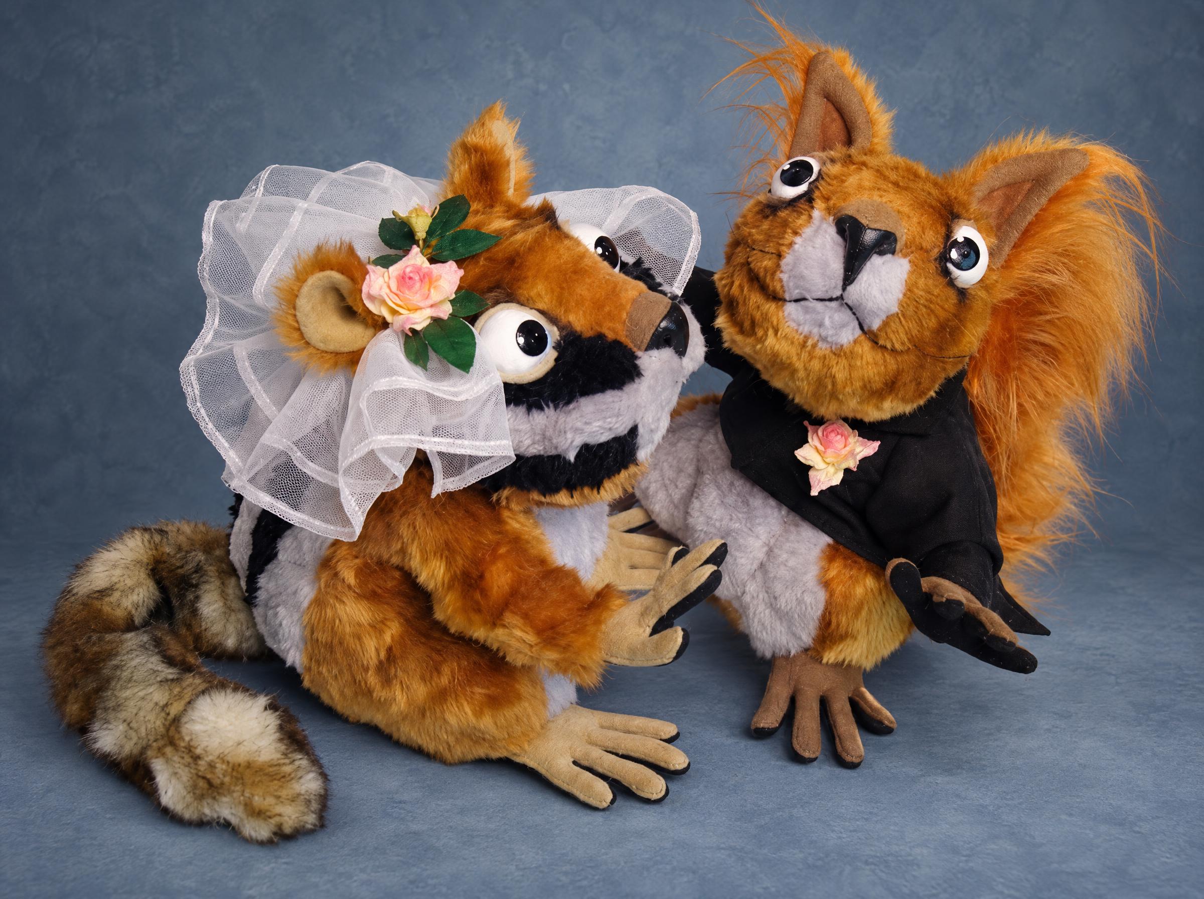 Bride and groom stuffed animals made to order: badger bride in a tulle veil with a rose, squirrel groom in a tux