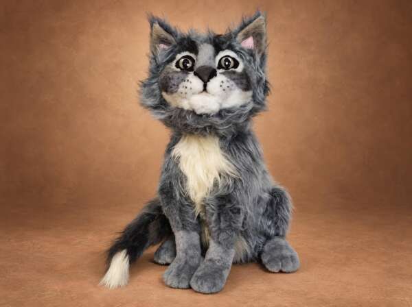 Cat plush from a photo of a real grey cat: shaggy blue-grey faux fur, cream chest and a white-tipped tail, handmade