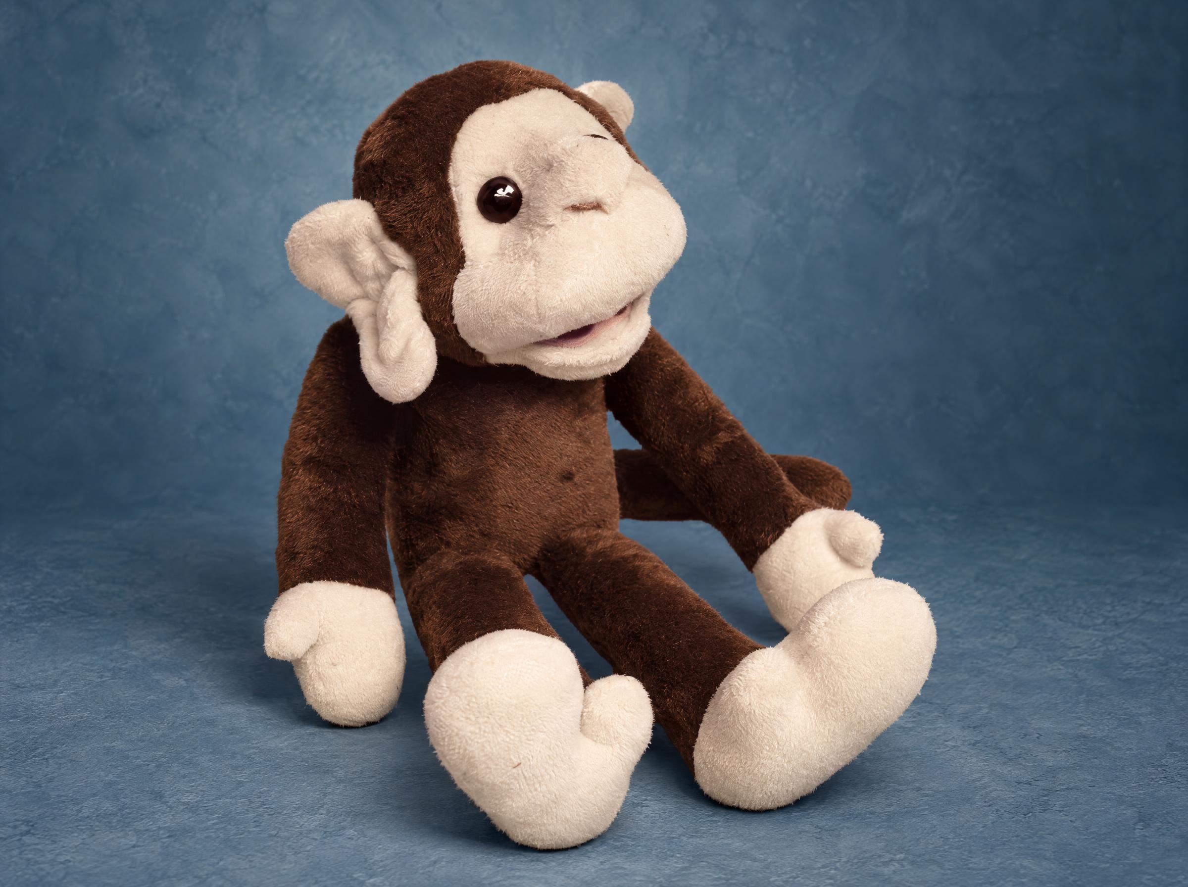 Handmade replica of a childhood monkey plush, remade to order from old photos, brown fur and a cream face