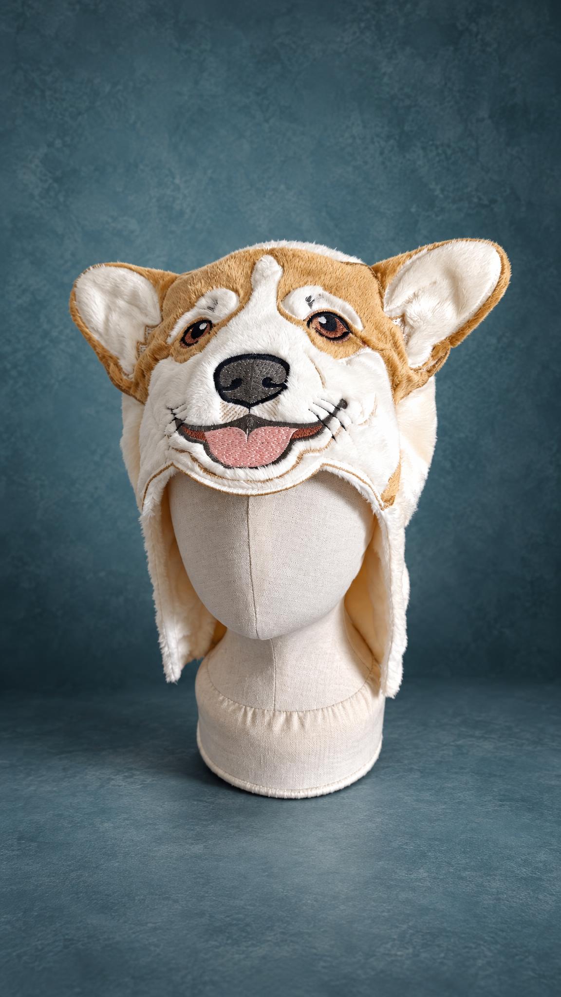 Corgi dog hooded towel prototype Corgi dog hooded towel prototype, handmade to order: cream and ginger plush, embroidered smile, on a mannequin