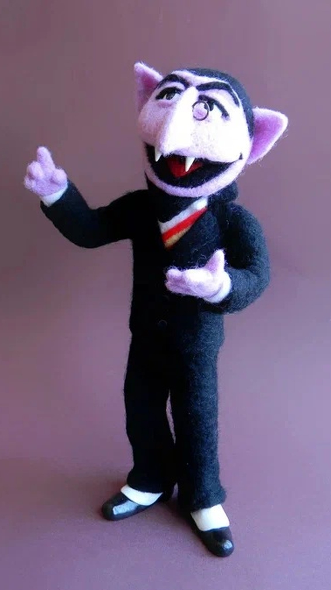 Handmade Count von Count stuffed doll in felted wool, monocle and pointing finger, a custom Sesame Street toy