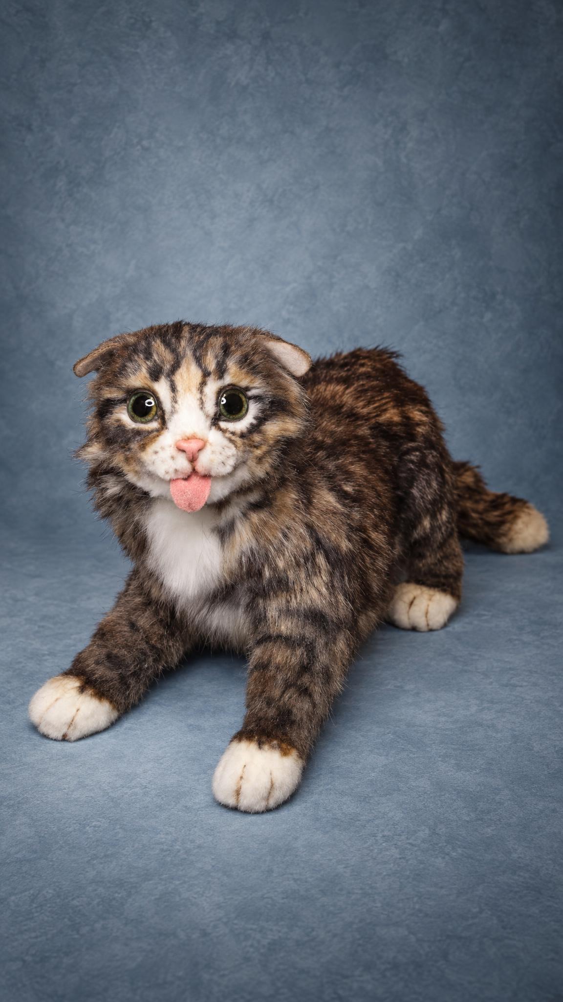 Memorial cat plush of a tabby with folded ears and a pink tongue, a personalized pet portrait made to order