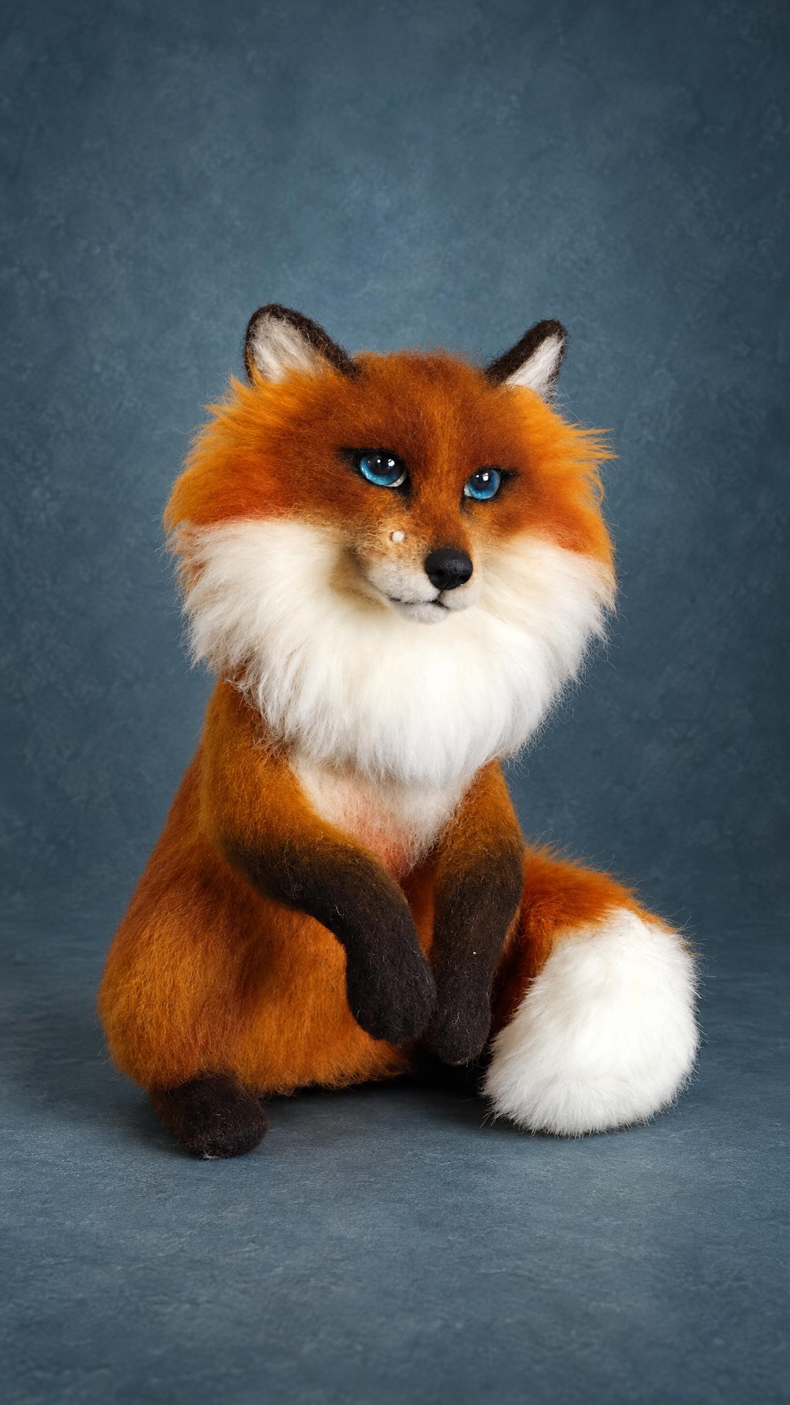 Custom felted fox, handmade to order: sly blue eyes, big white ruff and dark brown legs, one paw raised