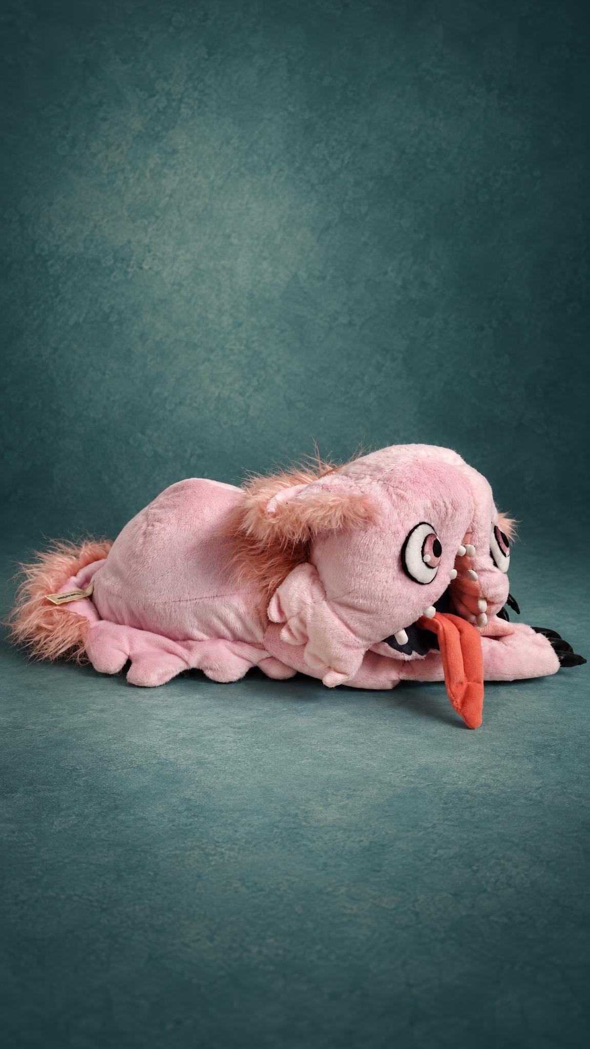 Custom Mitty plushie from Made in Abyss, sewn to order: long lumpy pink body ending in a shaggy fur tail
