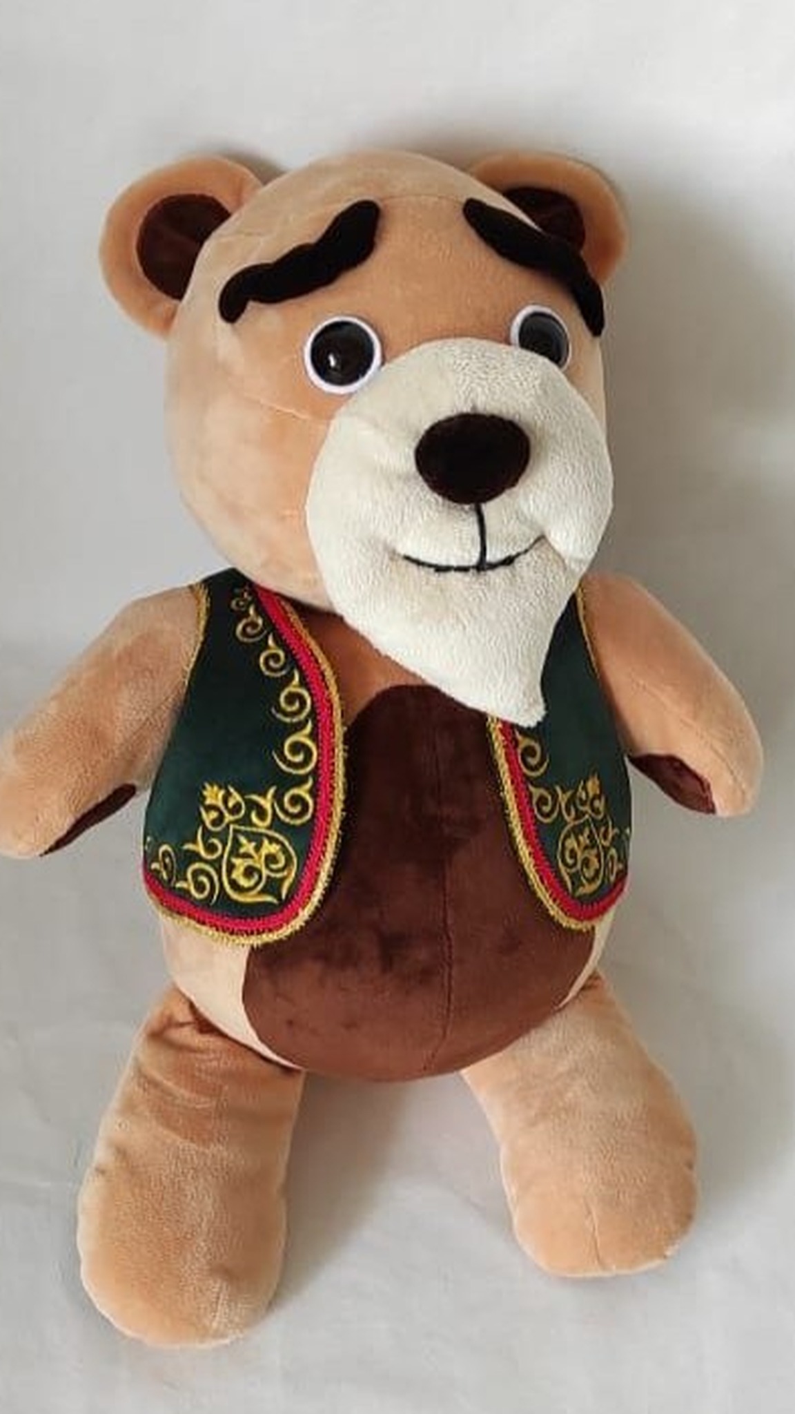 Custom plush teddy bear from a drawing, handmade as a production sample: goatee, black brows, velvet belly