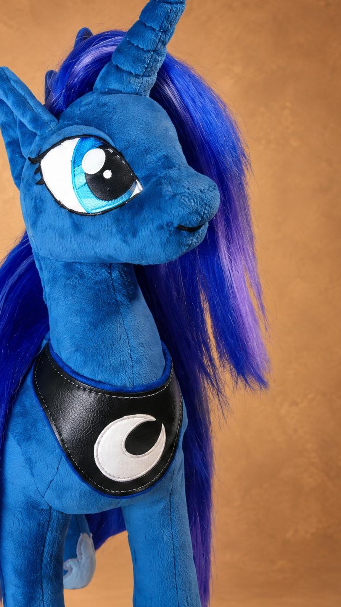 Custom Princess Luna plush with a crescent moon bib Custom Princess Luna plush with a big cyan eye and a black crescent moon bib, sewn by hand to order
