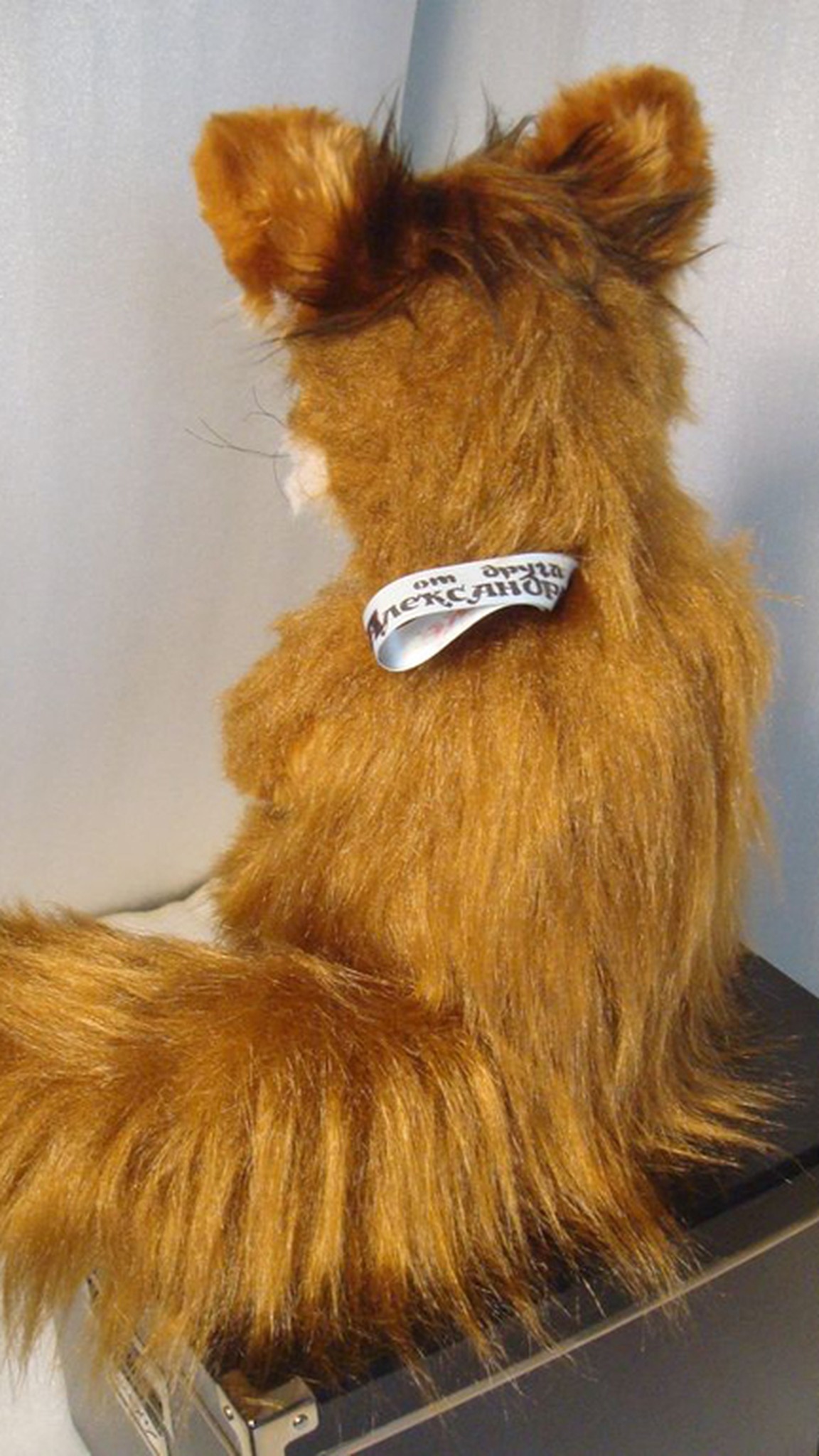 Custom Stoned Fox meme plush, a faux taxidermy fox with a bushy dark-tipped tail and a gift ribbon on its back