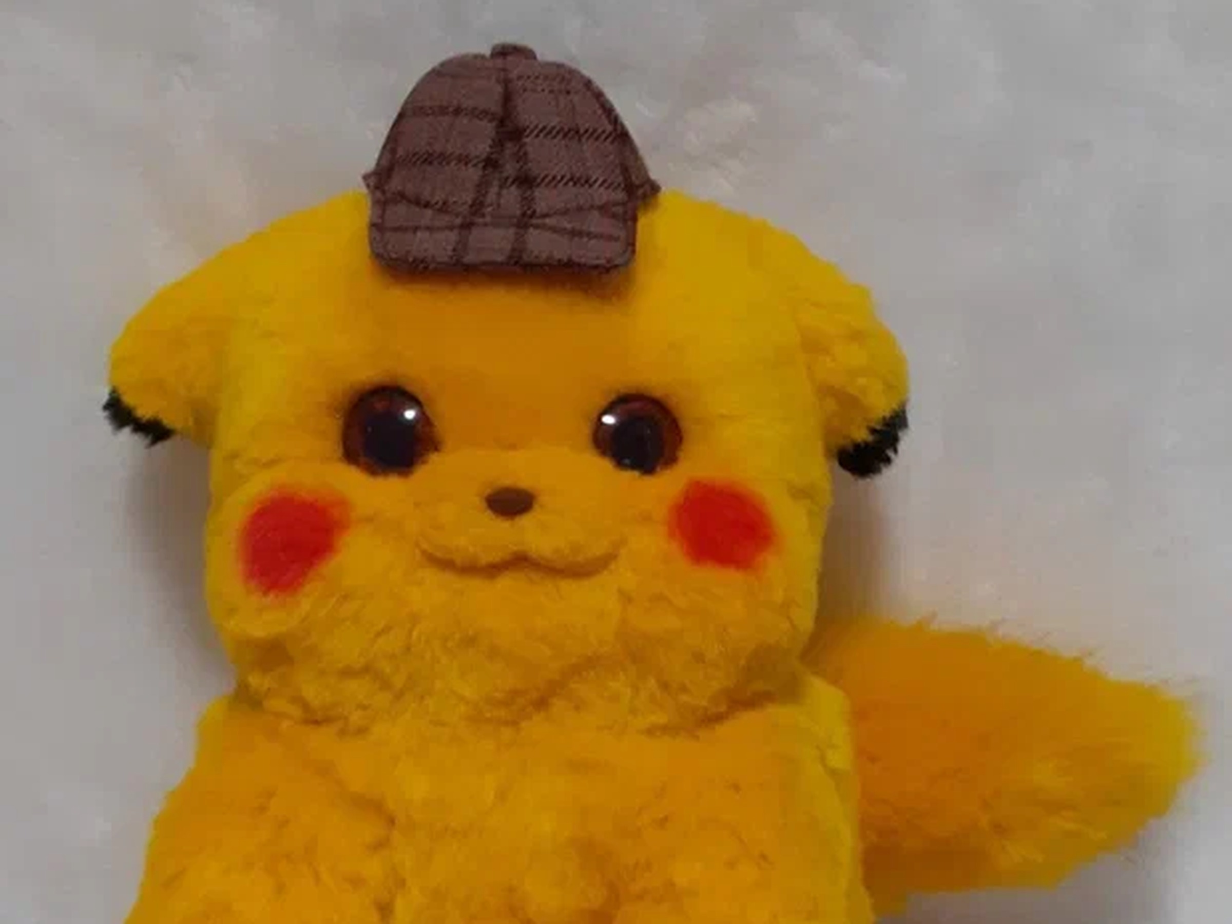 Custom Detective Pikachu plush, handmade to order with fluffy yellow faux fur, red cheeks and a plaid cap