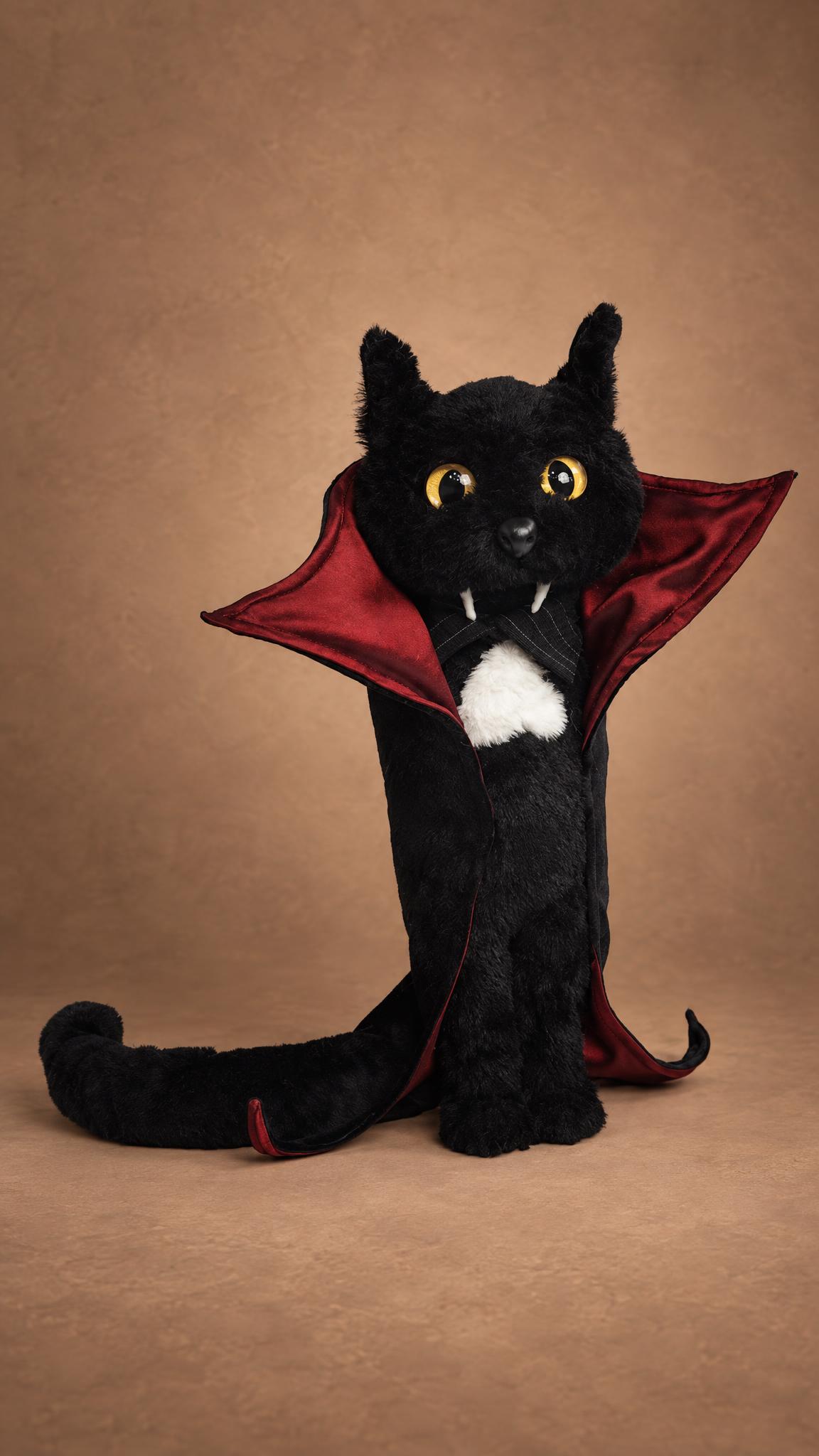 Custom meme cat plush: black vampire cat with a stiff cape collar, red satin lining and a long tail, sewn to order