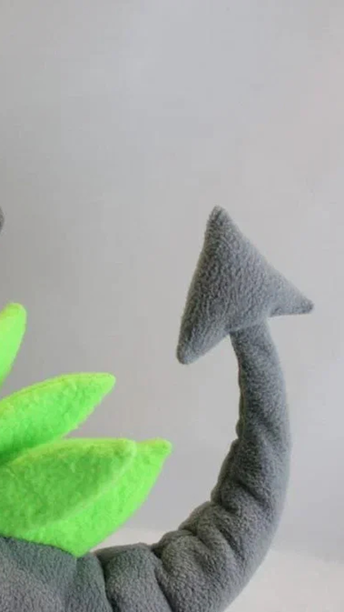 Dragon mascot plush arrow-tipped tail and lime-green fleece back spikes in gray fleece, a custom plush sewn by hand