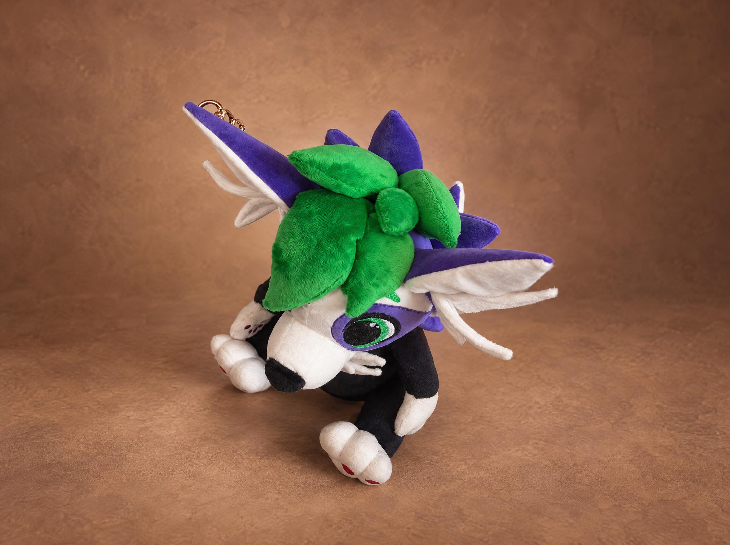 Fursona Plush Green Hair Handmade fursona plush seen from above, with green hair, purple spikes and white winged ears, custom made