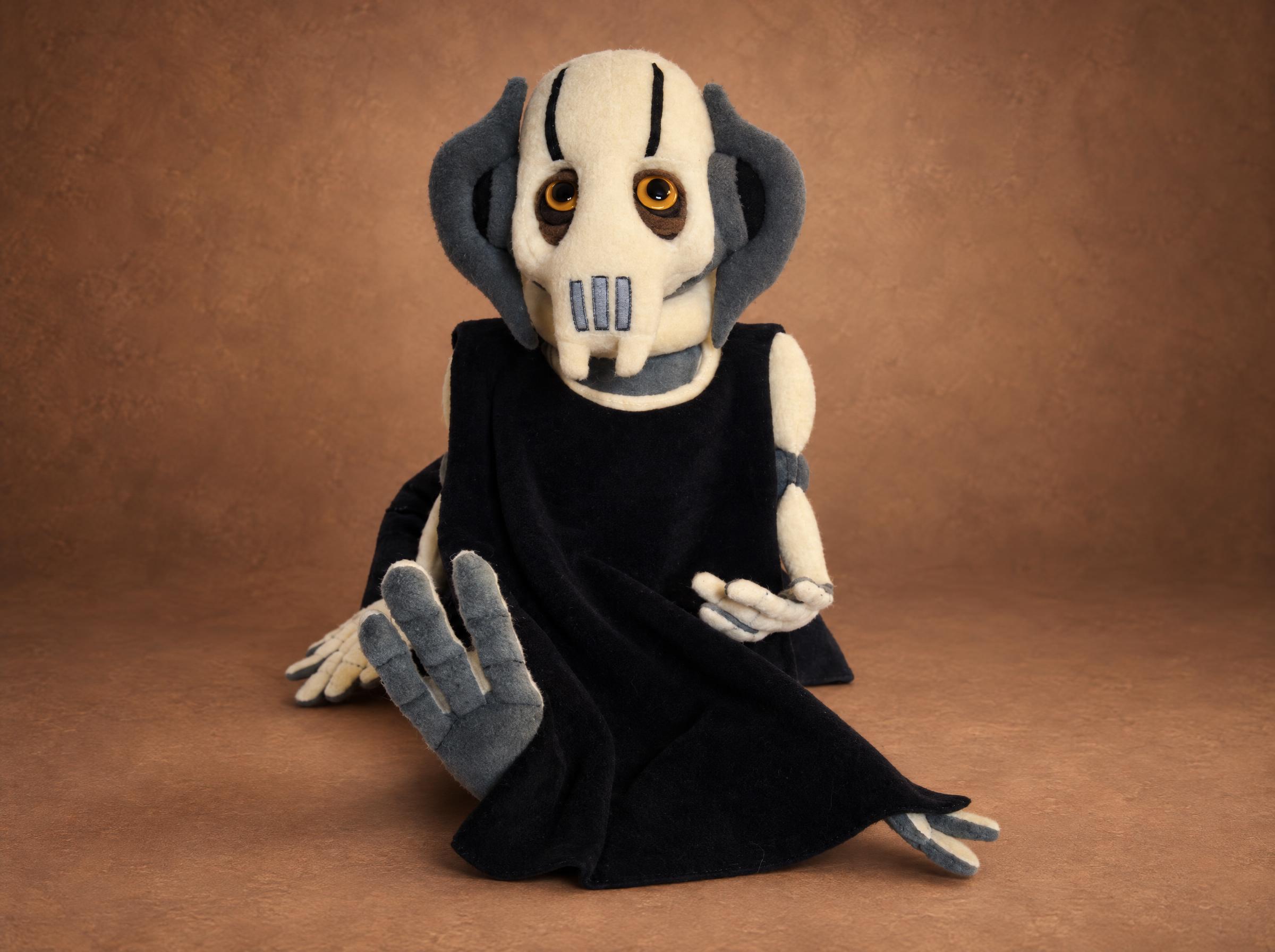 General Grievous plushie with his bone mask General Grievous plushie with a slotted jaw plate, grey side plates and amber eyes, handmade Star Wars plush