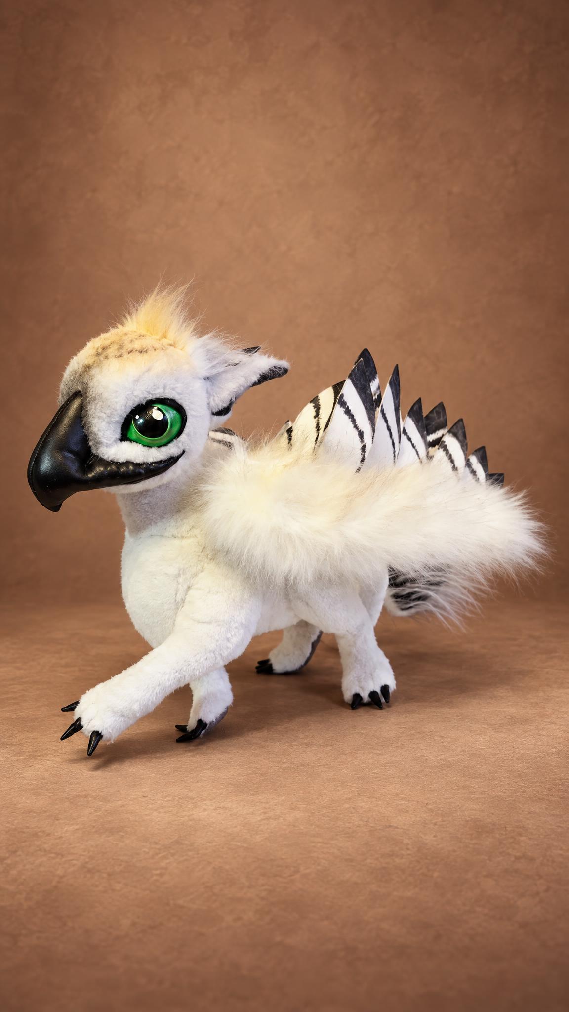 Custom griffin plush toy in white with a cream crest and black beak, a mythical creature handmade to order