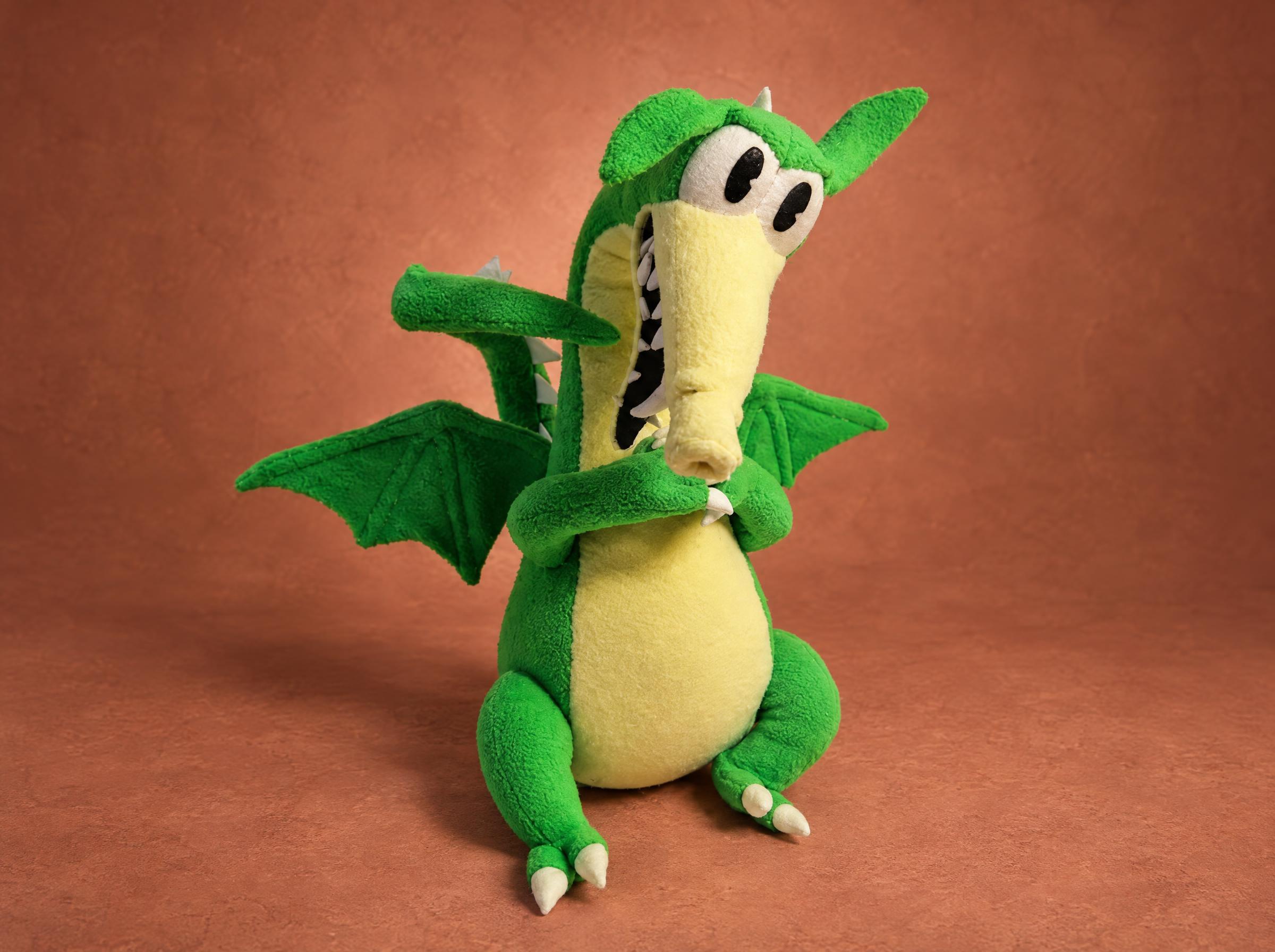 Grim Matchstick Dragon Plush with Wings Grim Matchstick dragon plush from Cuphead with green wings spread and a yellow belly, a custom handmade toy