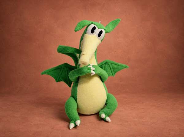 Custom Grim Matchstick plush from Cuphead, handmade to order in green fleece with wings and a yellow snout