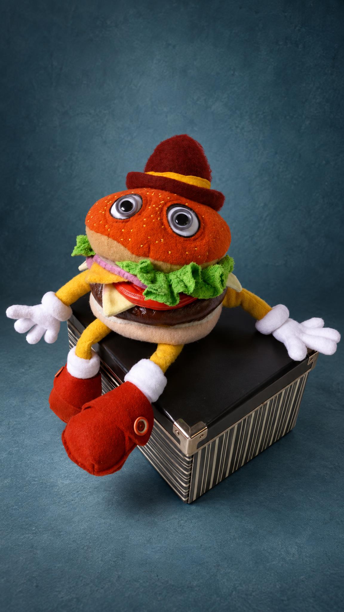 Handmade hamburger man plush from a drawing, a custom gift: felt hat, googly eyes, fabric lettuce and red shoes