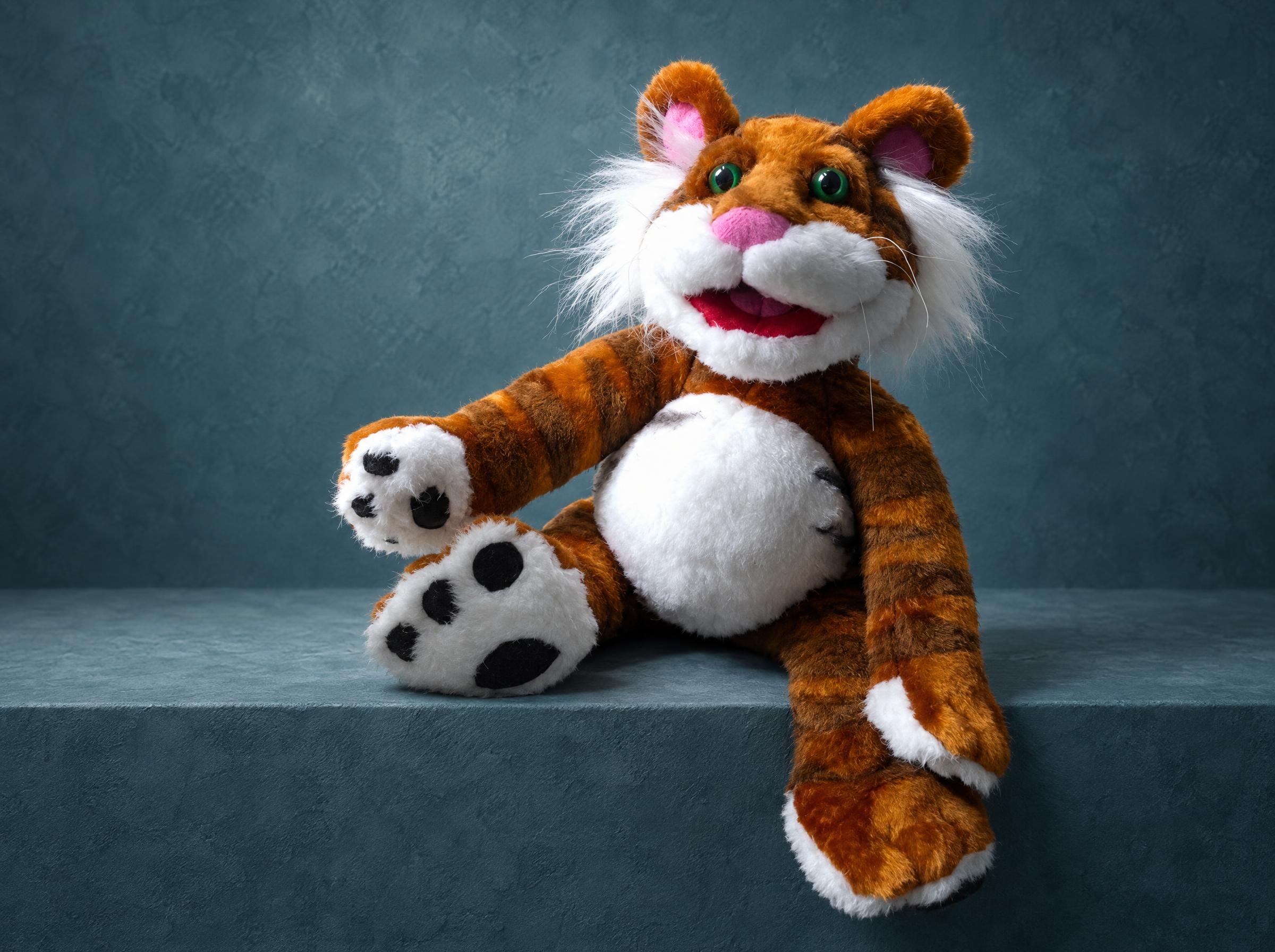 Handmade Rugby Tiger Plush, Custom Made Handmade Rugby tiger plush on a ledge, one paw raised, white cheek fur and pink nose, made to order