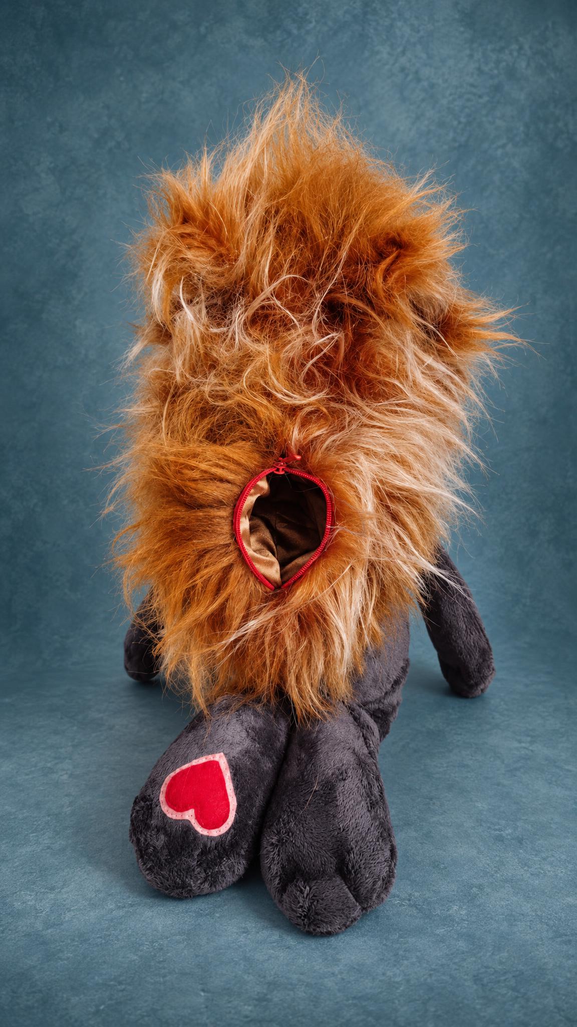 Hedgehog plush with a secret zip pocket hidden in its fur spines, red zipper and satin lining, made to order