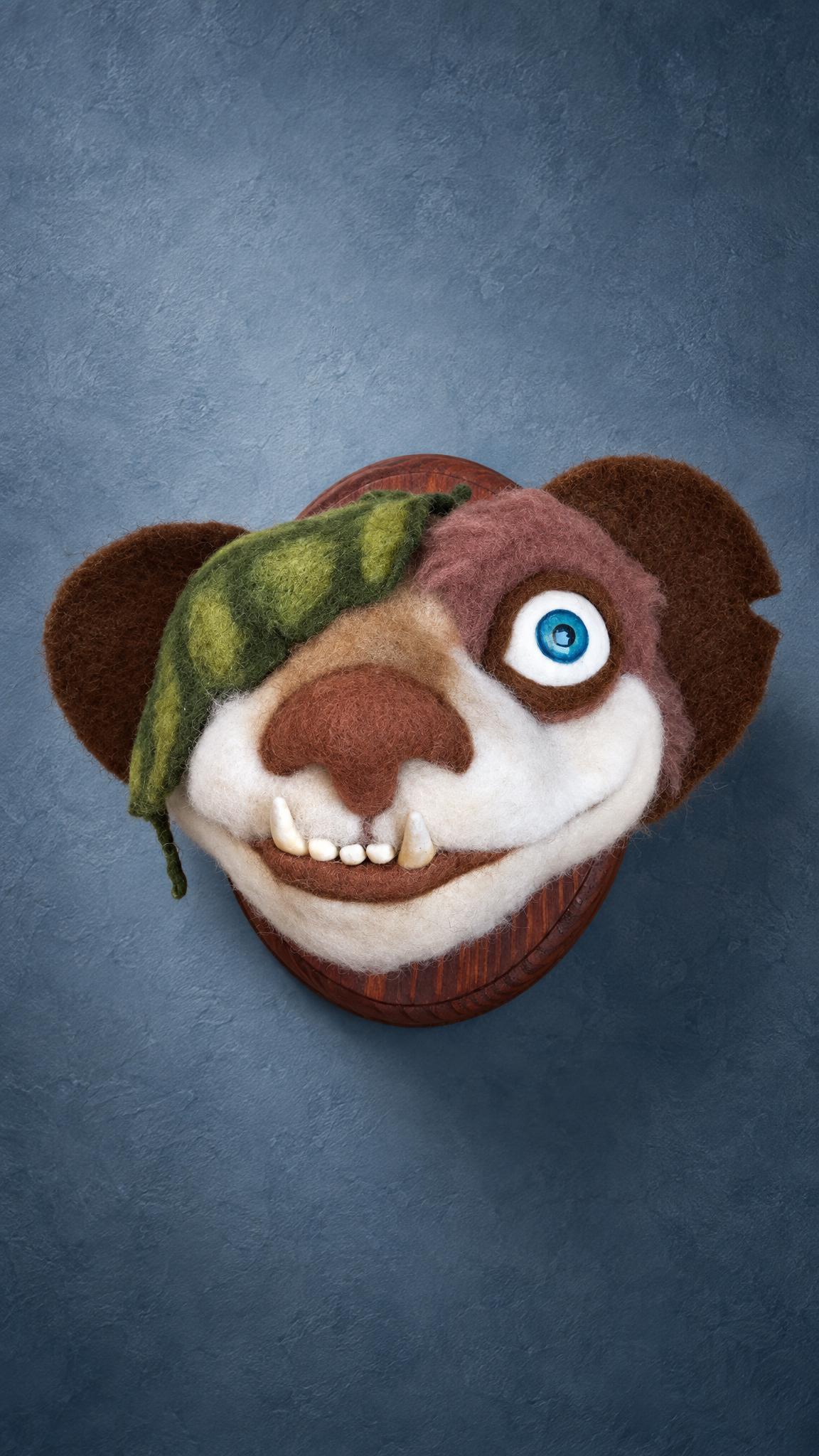 Buck weasel plush head from Ice Age with a wide fanged grin, felted wool on a wooden plaque, custom handmade