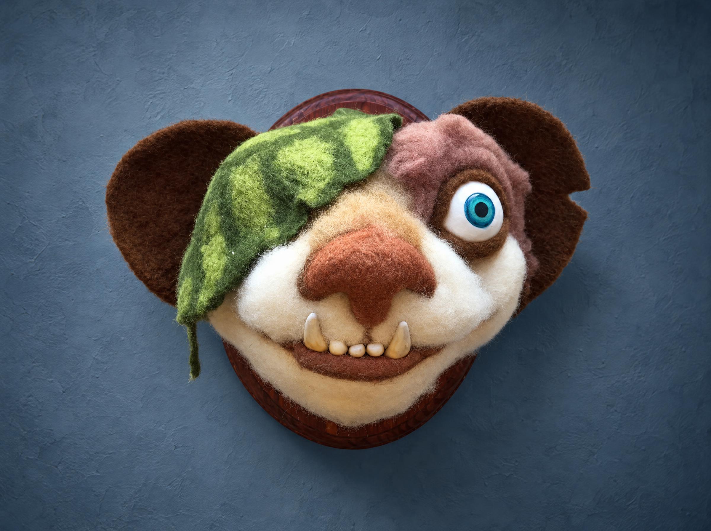Ice Age Buck plush head with a leaf eye patch, needle-felted wool faux taxidermy on a plaque, made to order