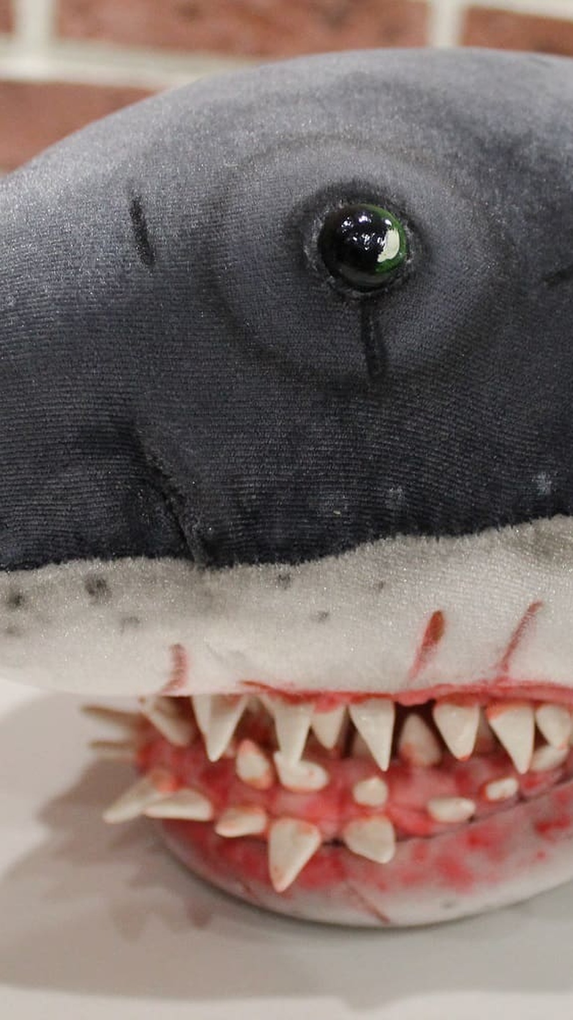 Jaws shark plush snout with a glass eye and bloody teeth, a handmade movie shark toy made to order