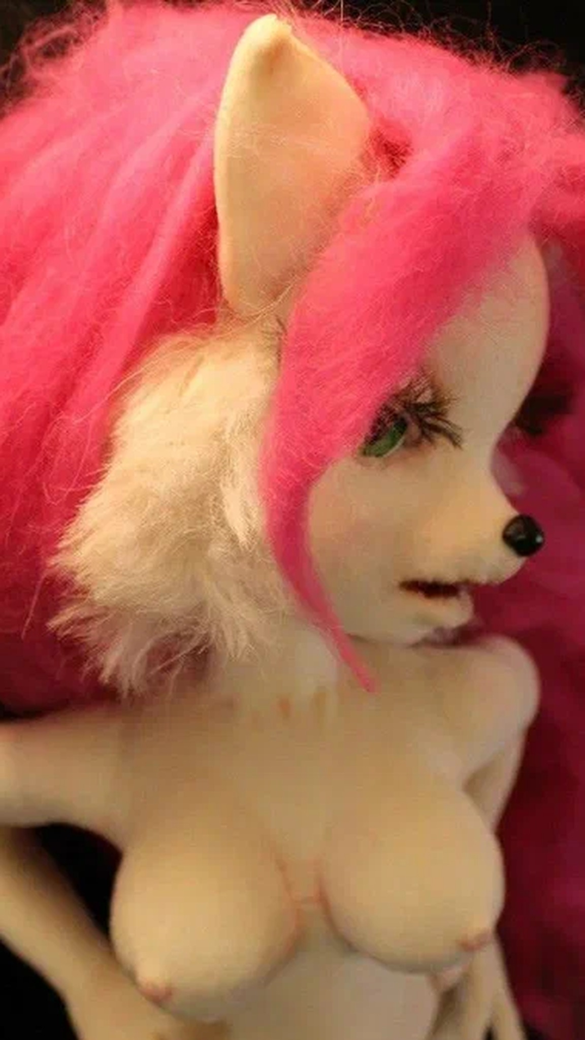 Jenny doll face with green eyes, a white faux-fur ruff and pink hair, a custom Bucky O'Hare art doll made to order