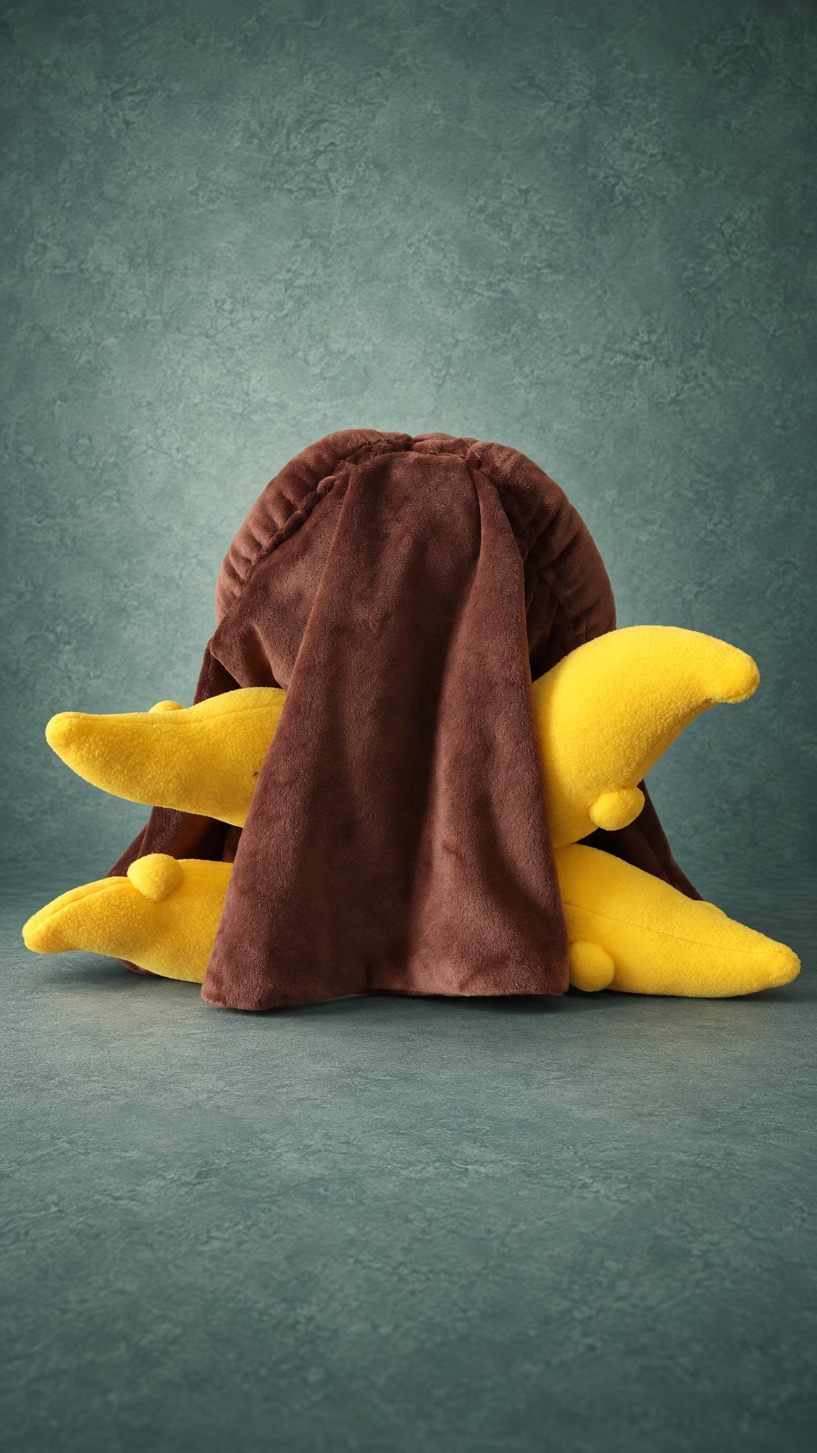 Kara Gremykha OC plush from behind: long brown hair down her back over yellow tentacles, made to order