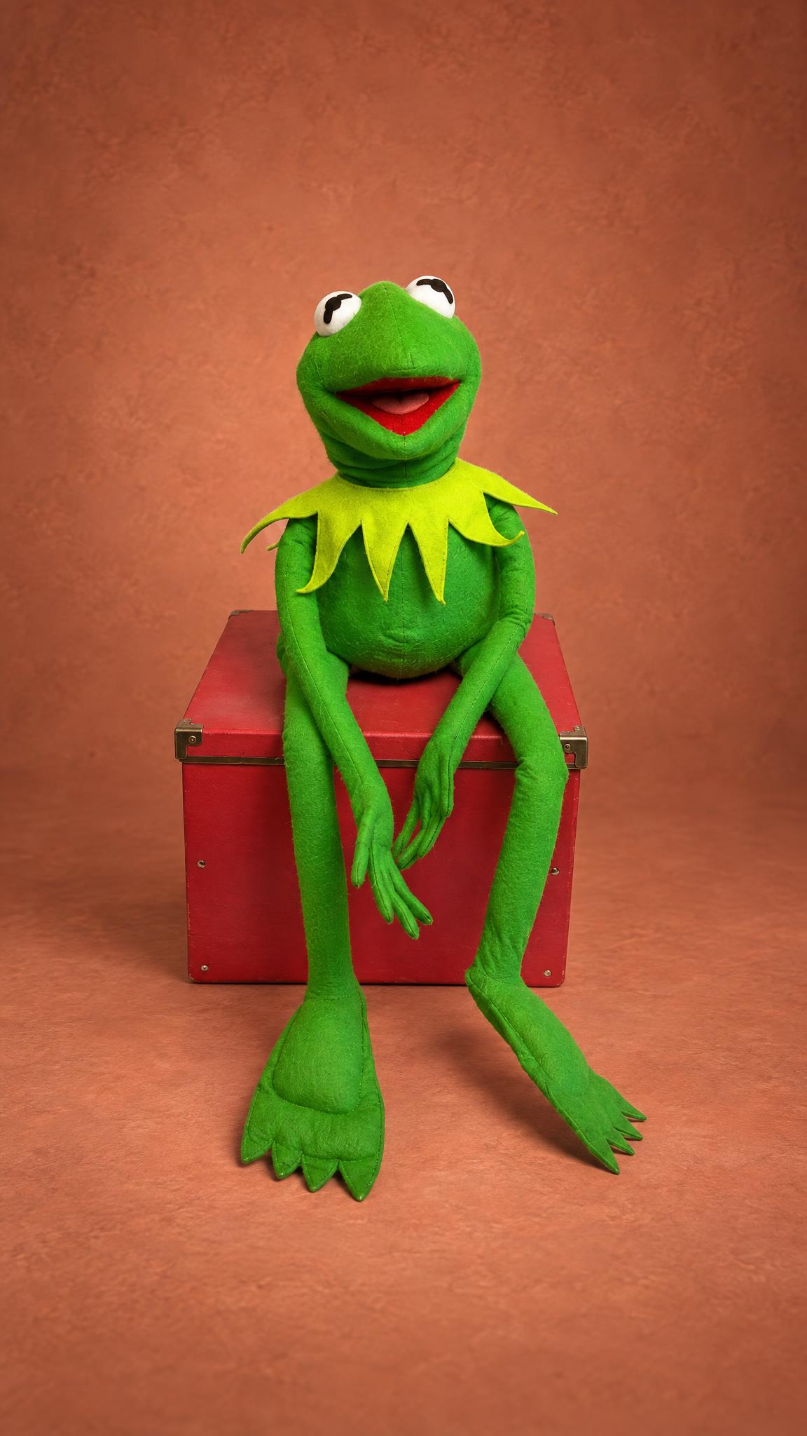 Kermit the Frog plush made to order, sitting on a red box, long green felt legs hanging down, custom Muppet toy