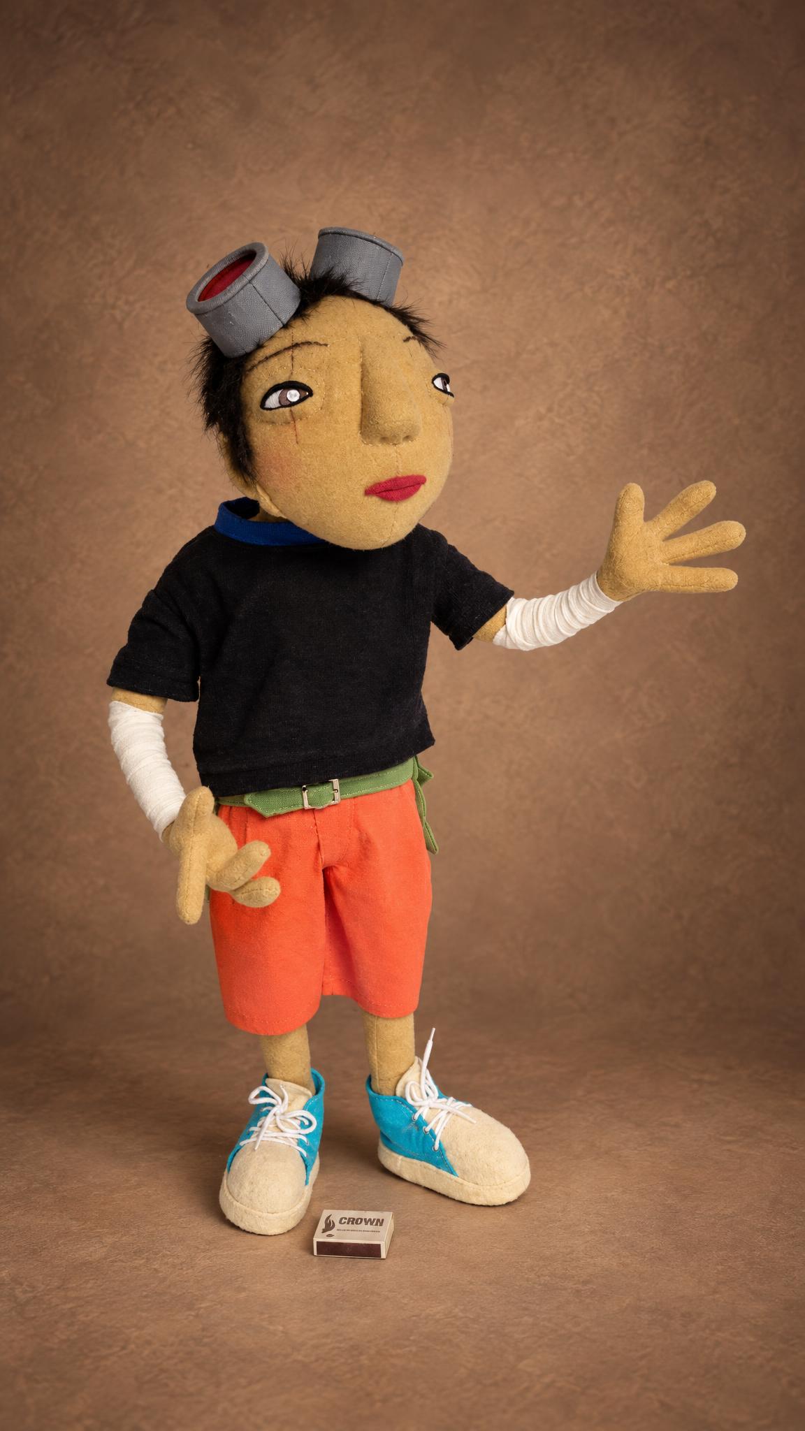 Custom Kuro doll from Tekkonkinkreet, handmade to order with goggles, a black T-shirt and orange shorts