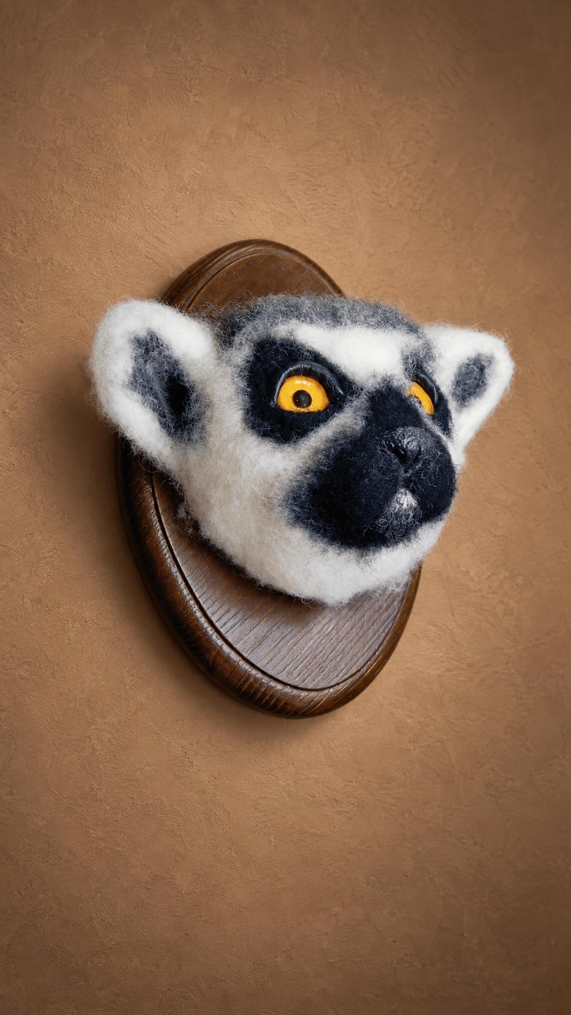 Lemur head wall mount, faux taxidermy made to order Lemur head wall mount made to order: a ring-tailed lemur in faux taxidermy with amber eyes on a wooden plaque