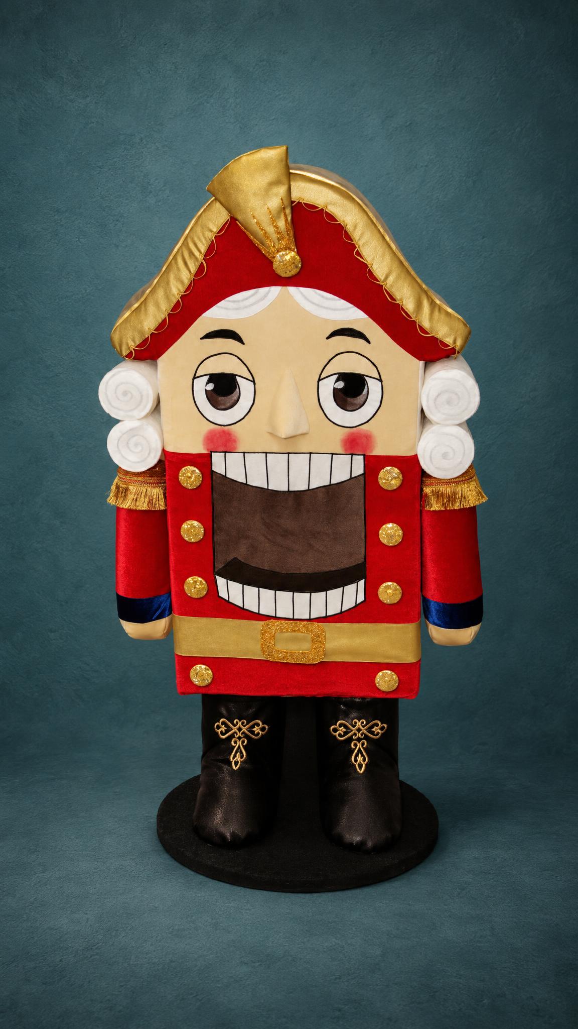 Life-size Nutcracker plush, made to order Life size Nutcracker plush made to order: 1.2 m soft figure in red velvet with gold buttons and a toothy grin