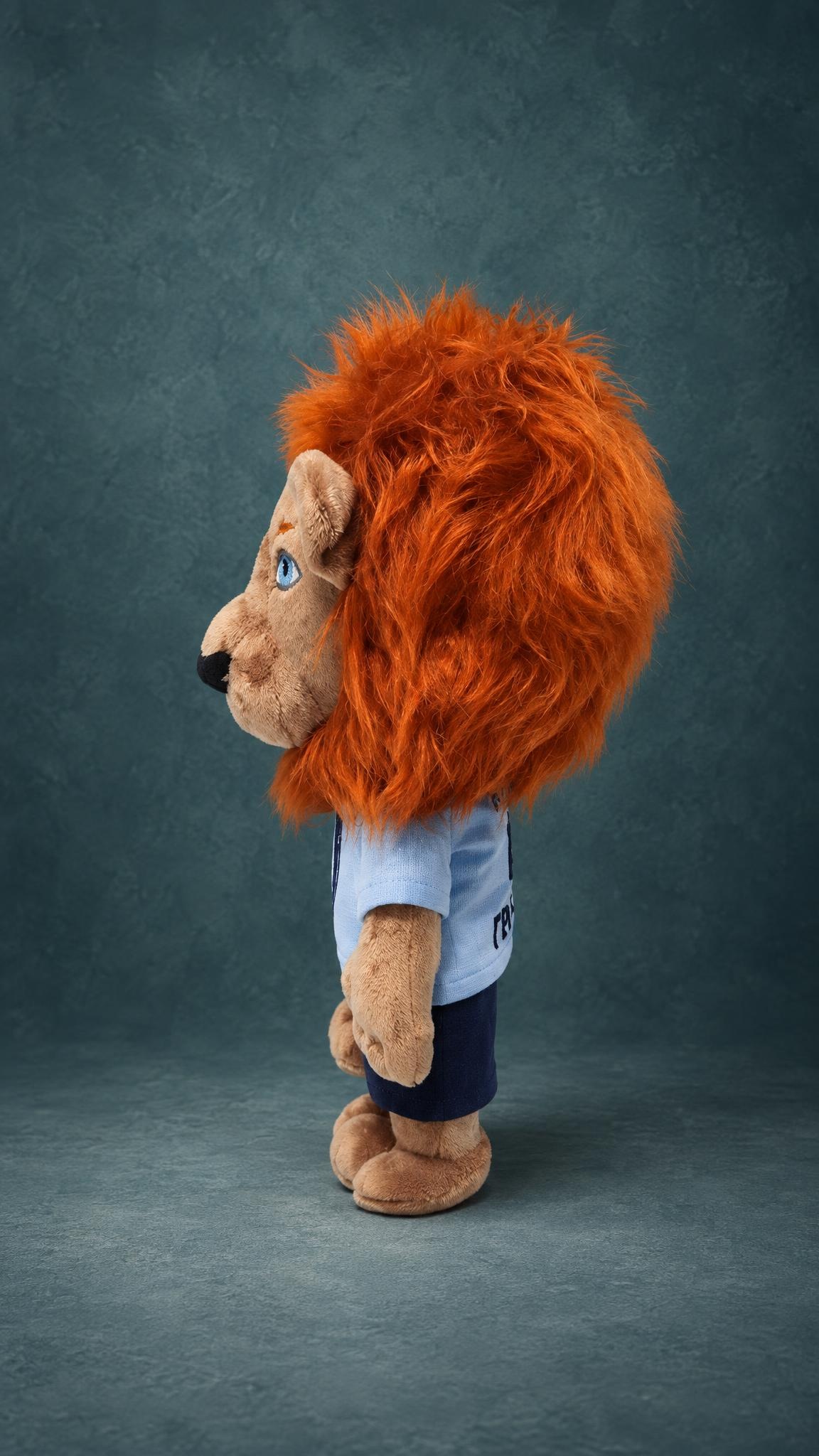 Lion mascot plush with a big shaggy orange faux-fur mane and tan minky muzzle, custom made for a football club