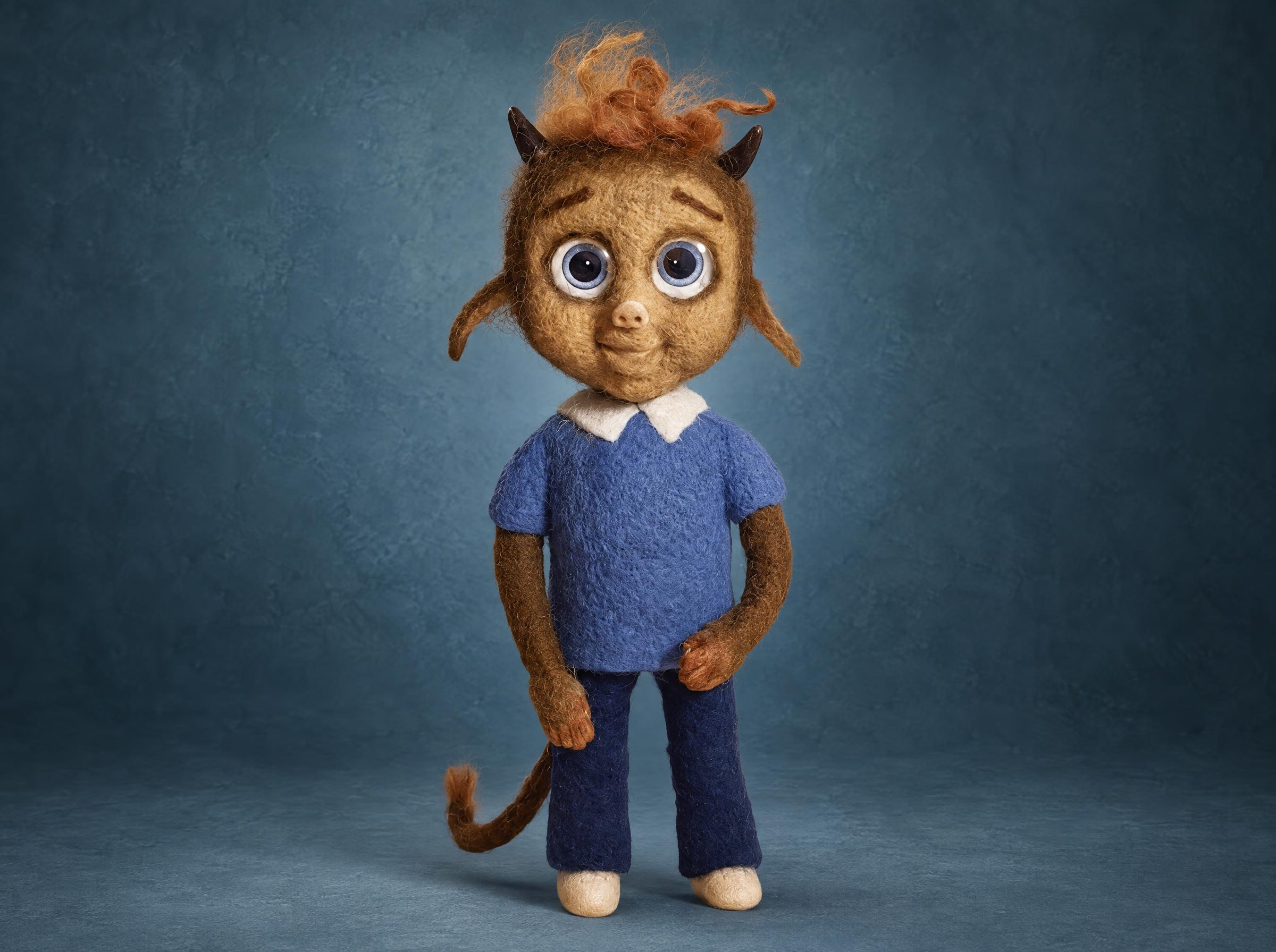 Handmade little demon doll sewn to order from a book illustration, felted face, tiny horns and a blue shirt