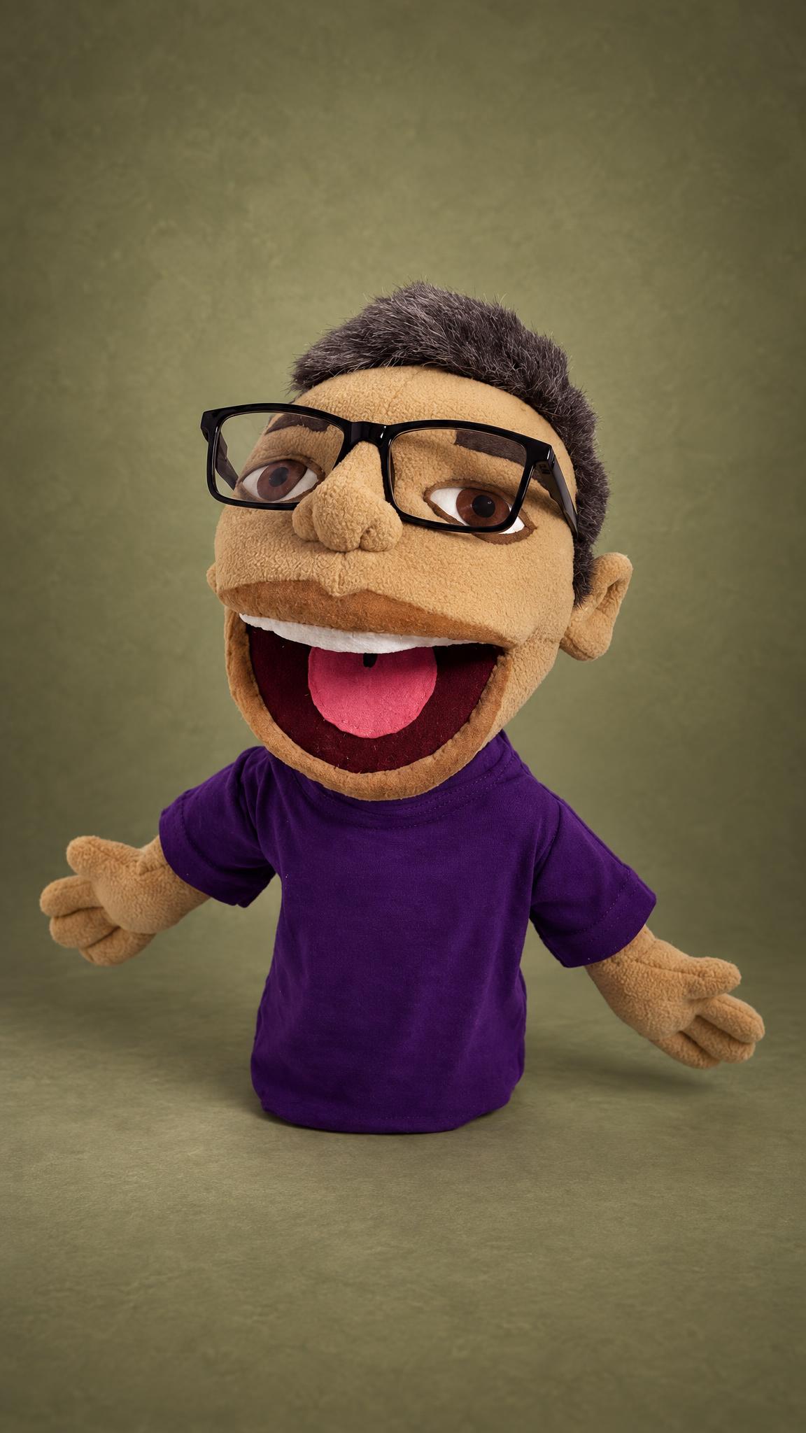 Custom talking puppet of a blogger, mouth wide open, black glasses, purple tee, sewn to order from photos