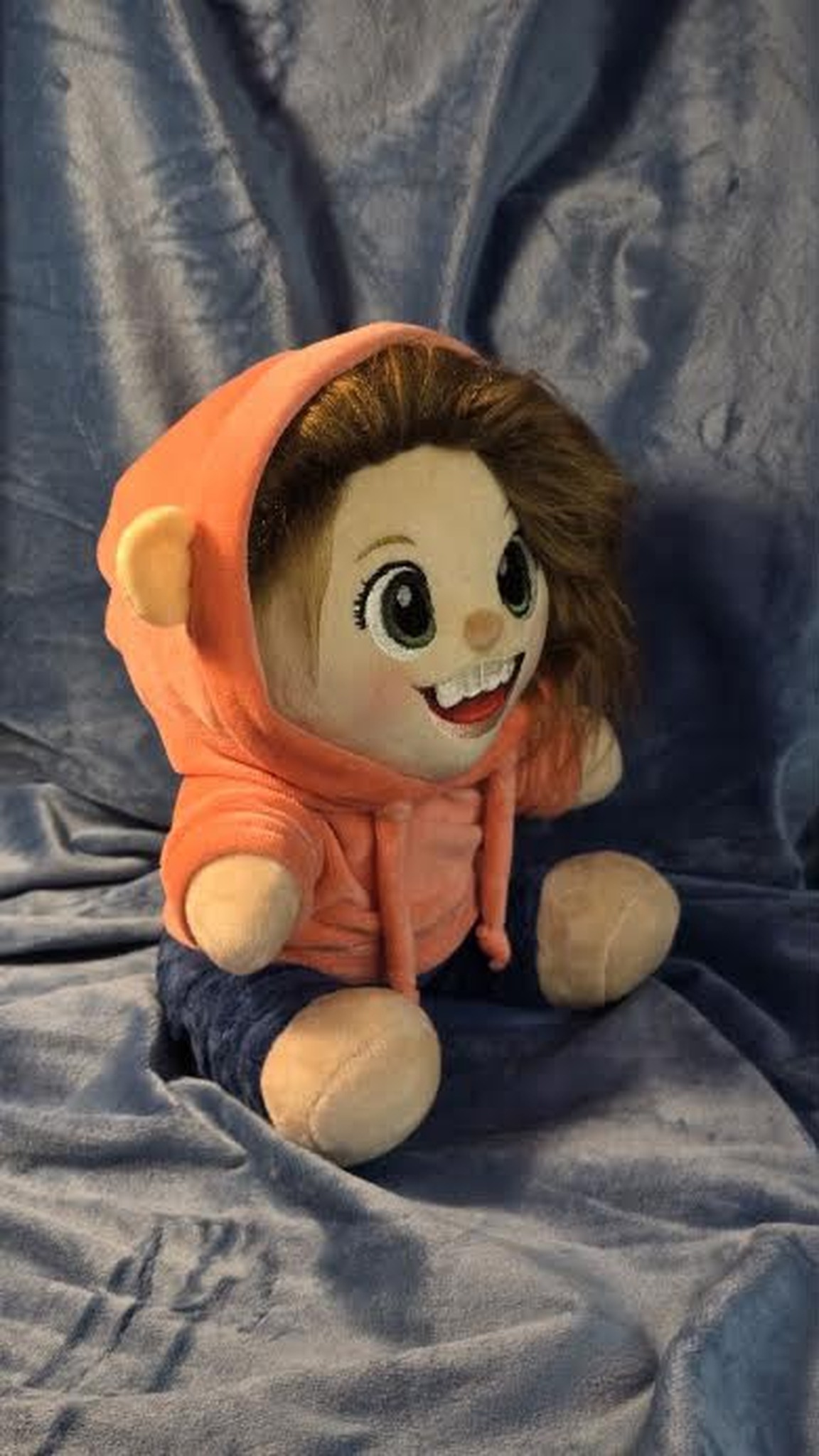 Look-alike plush doll of a girl in an orange hoodie with drawstrings, handmade to order