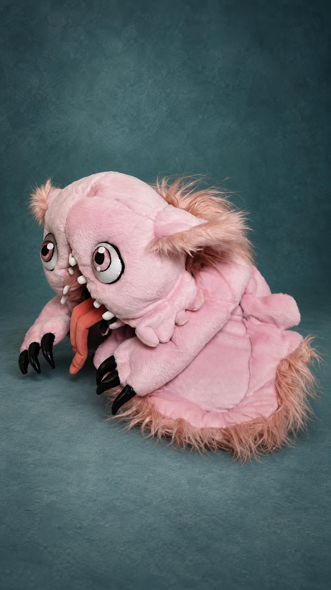 Made in Abyss Mitty plush, custom made: shaggy dusty-pink faux fur fringe around her lumpy fleece body