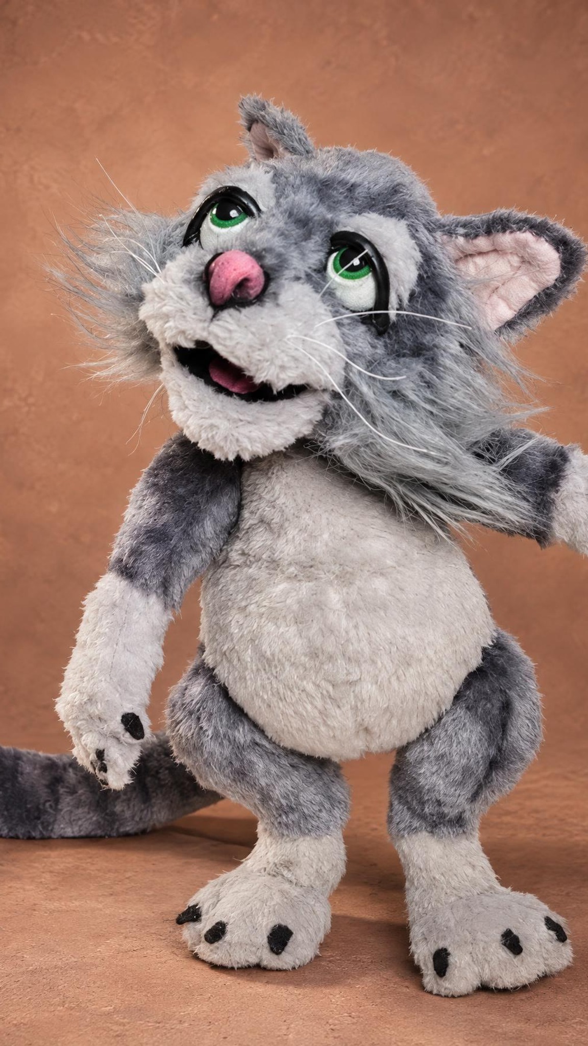 Marion the cat plush with his arms out and a long striped tail, a Mongrels character handmade to order