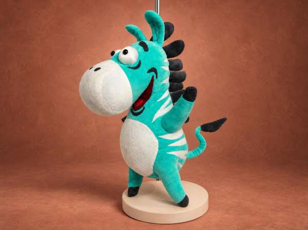 Mint zebra plush made to order from a Telegram sticker, waving a hoof, cream stripes and a charcoal mane